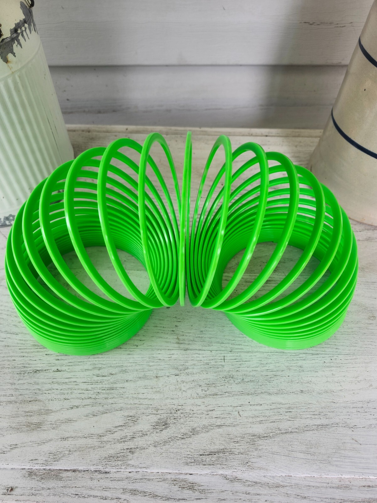 Giant Slinky – Green, Yellow, Orange or Pink 5.25″ diameter in opening, 5.25″ i
