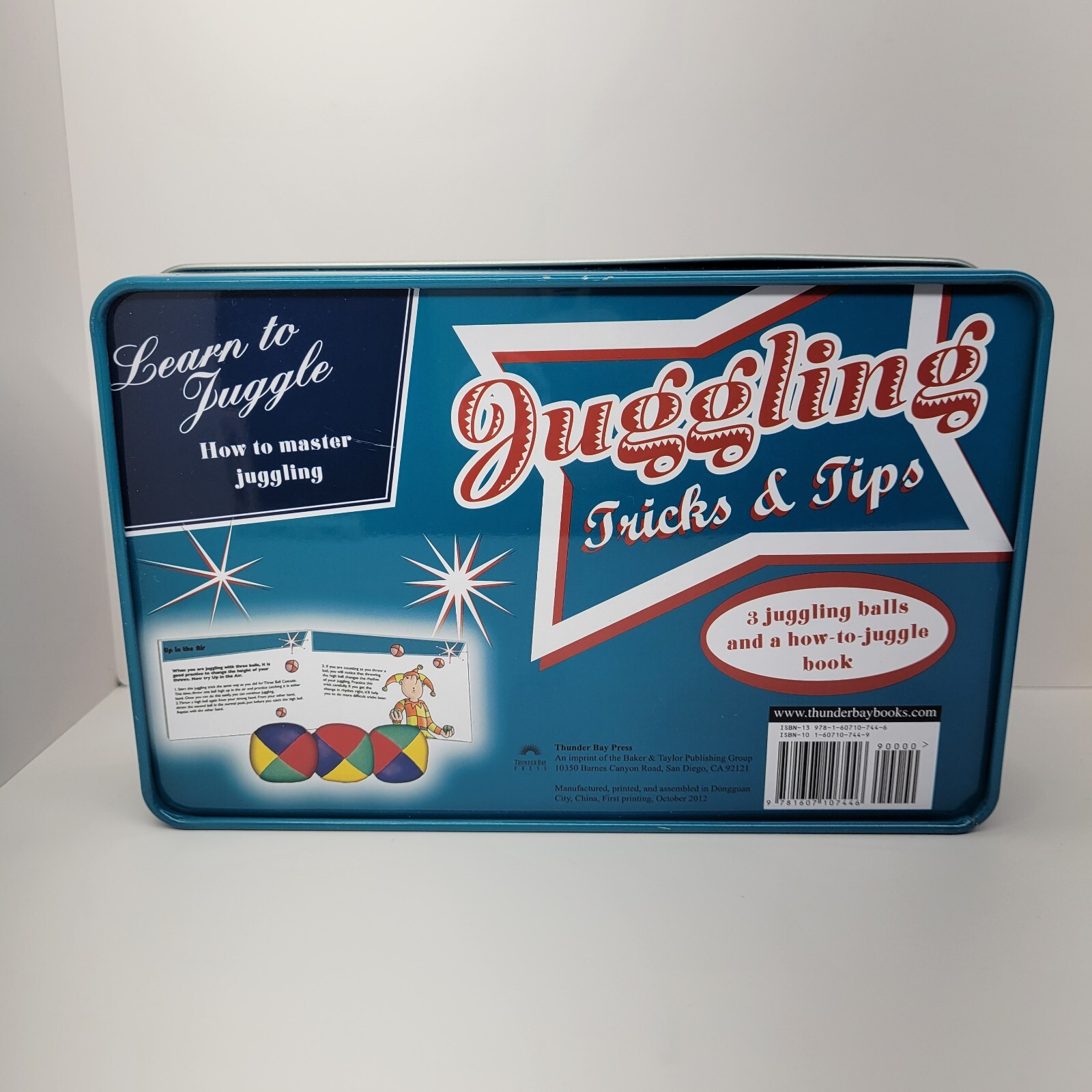 Juggling Tricks and Tips Includes Three balls and Instruction Book In Tin