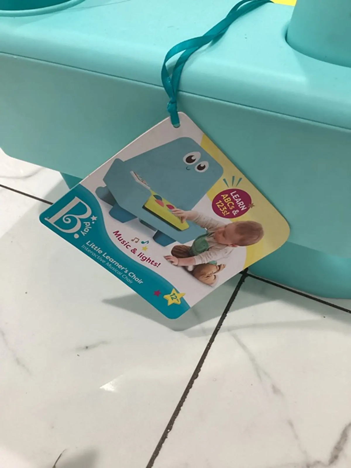 B. play Interactive Musical Chair – Little Learner’s Chair