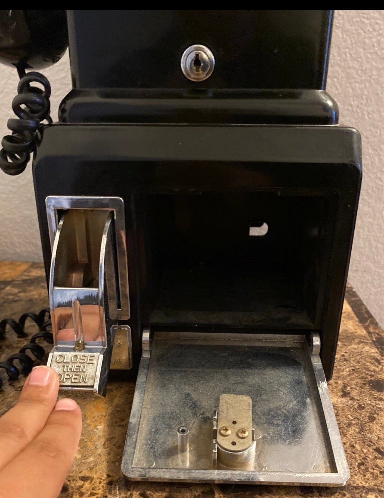 Black Phone With Coin Catcher