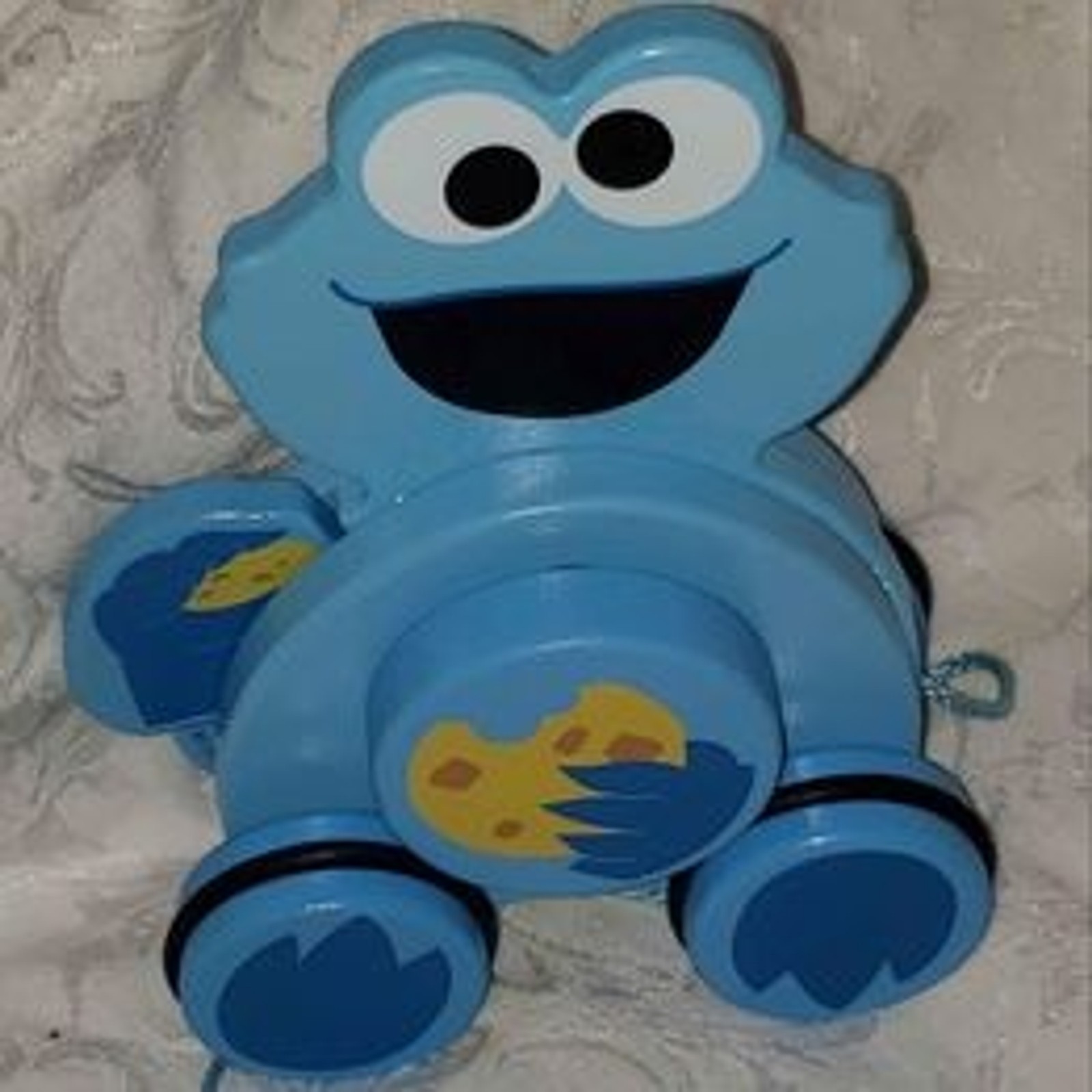 Bright Starts Sesame Street Cookie Monster Snack & Stroll Wooden Pull Toy