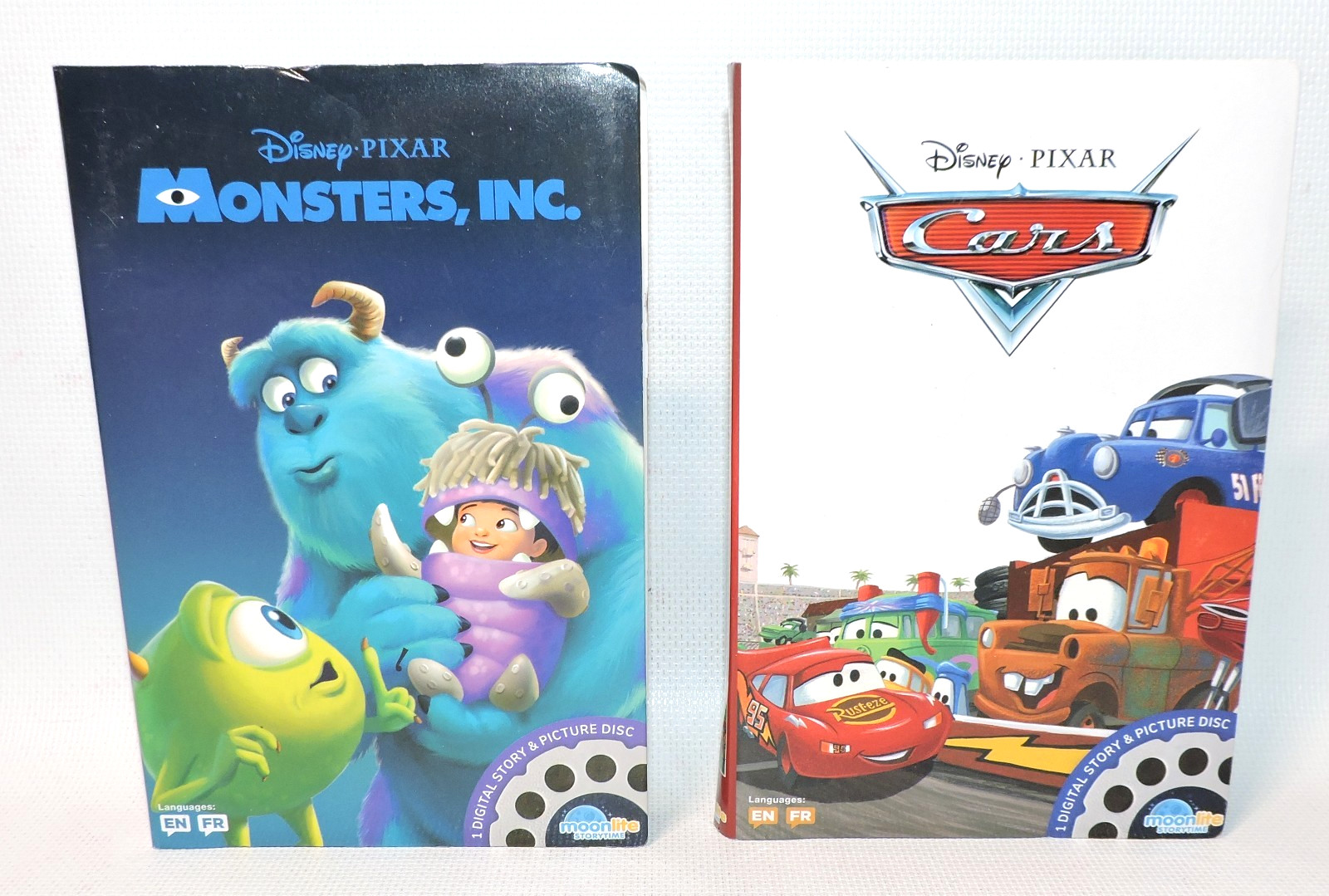 LOT OF 2 Moonlite Story Reels & Picture Discs Disney Pixar Monsters, Inc. & Cars