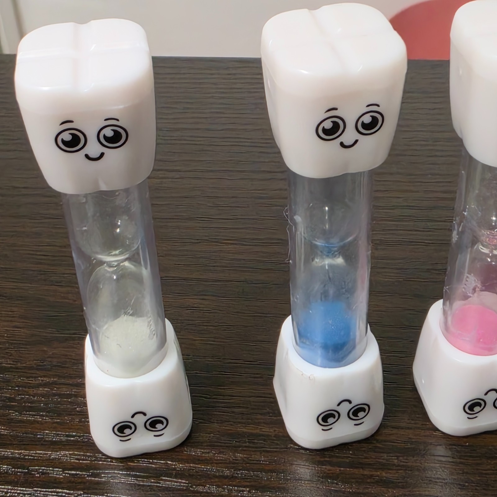 SuLiao toothbrush sand timers designed for children with various uses.