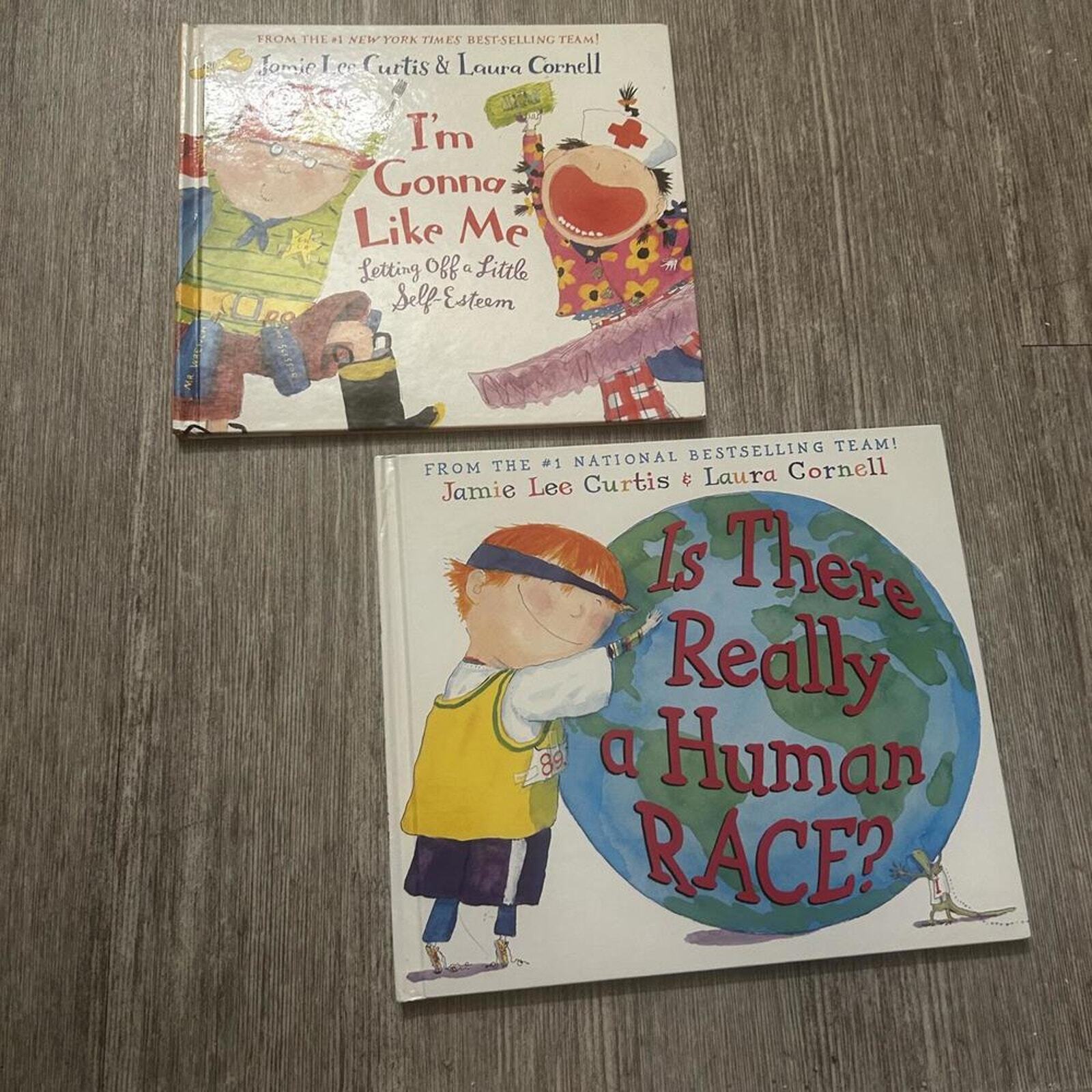 Two Hardcover Books-I’m Gonna Like Me & Is There Really A Human Race?