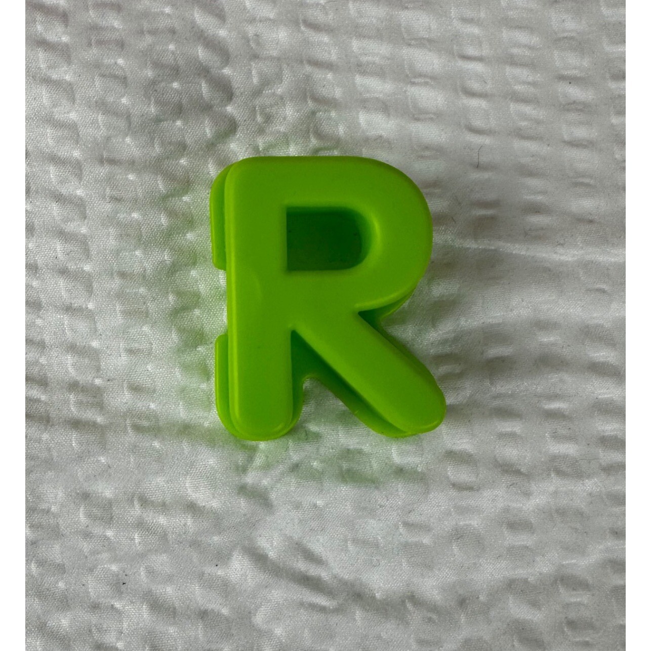Letter “R” for Elmo On The Go learning game.