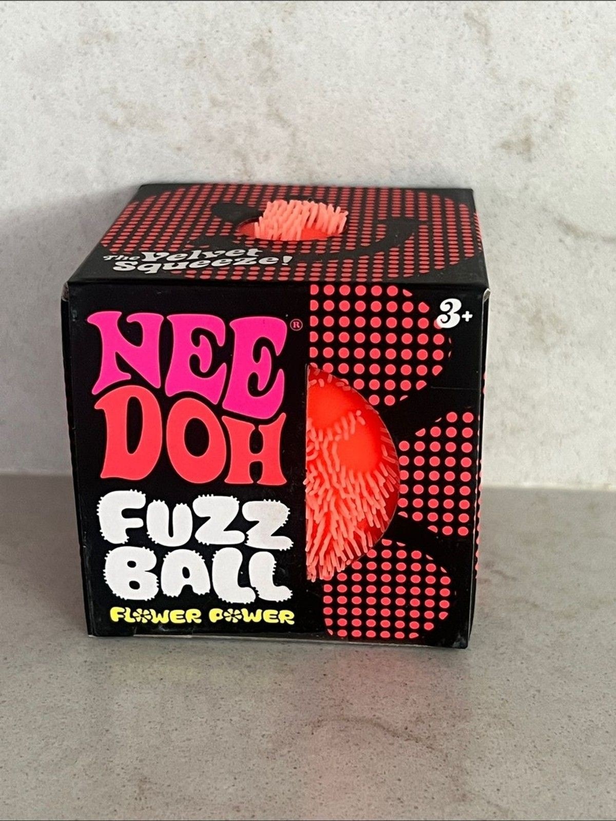 NeeDoh Fuzz Ball Flower Power Orange groovy