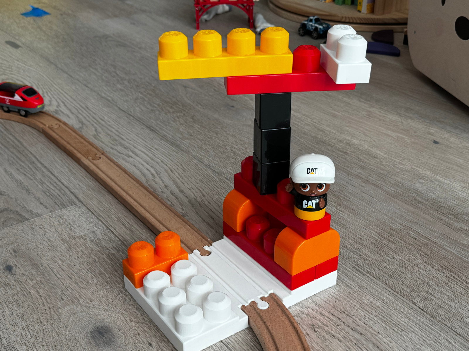 Large 2 x 4 two-sided Mega Bloks build plate with wooden train track