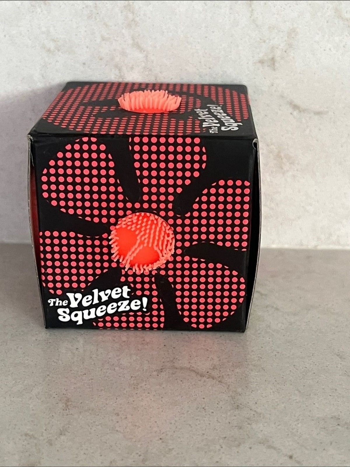 NeeDoh Fuzz Ball Flower Power Orange groovy