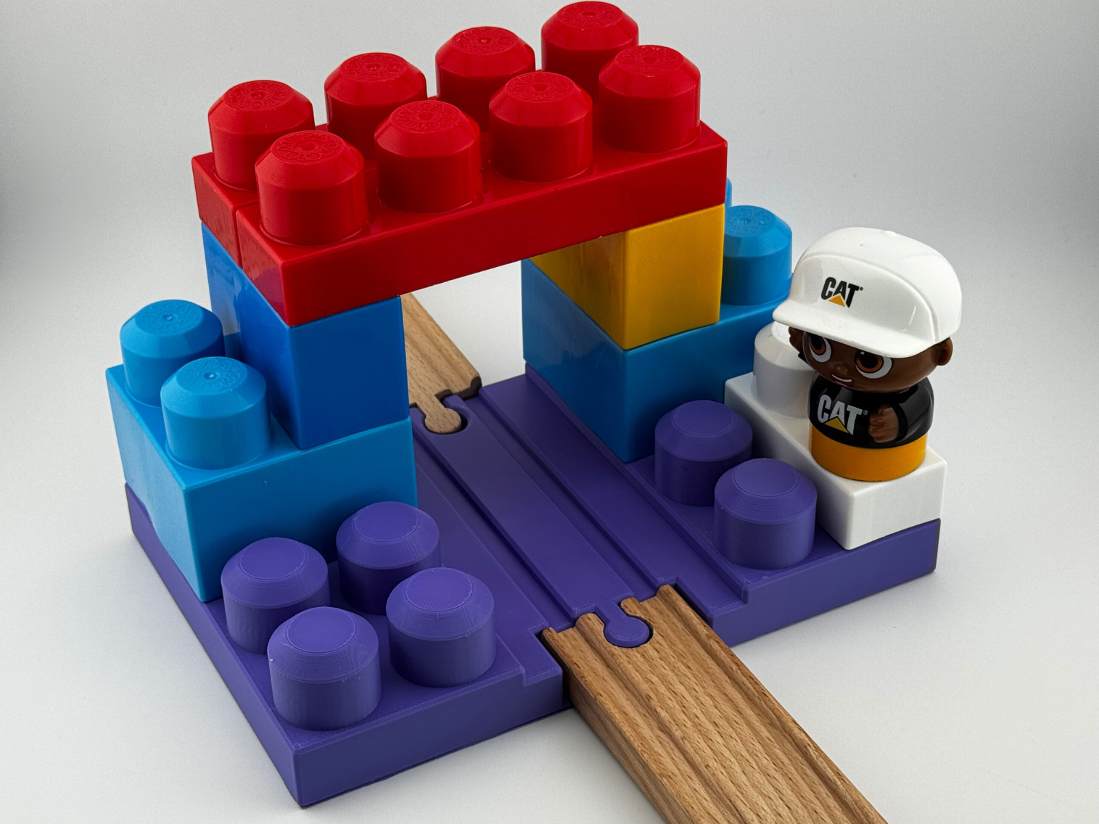 Large 2 x 4 two-sided Mega Bloks build plate with wooden train track