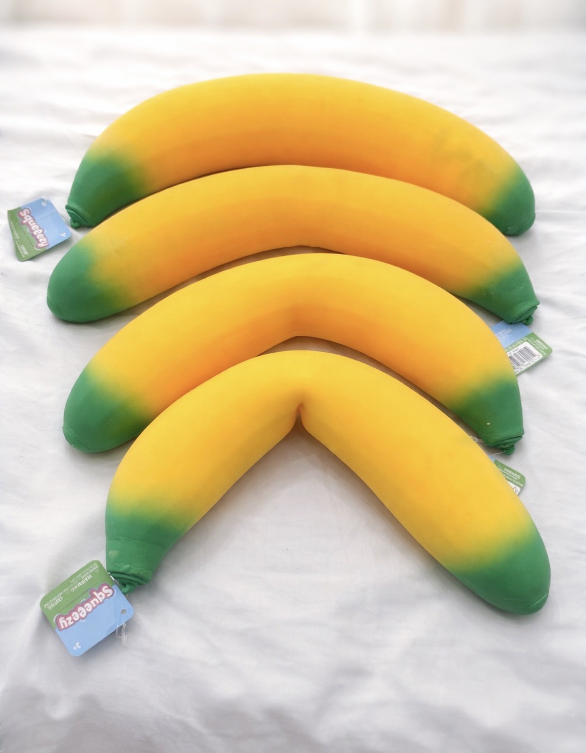 4 (Four) Sunny Days Squeezy Banana Yellow Squishy Toy Stress Relief Sensory Fun