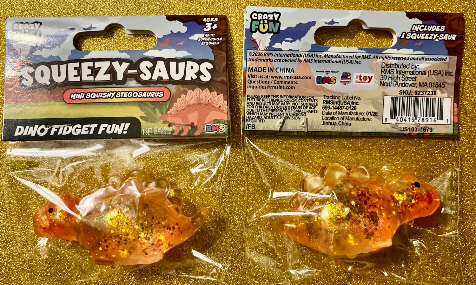 RMS CRAZY FUN ORANGE GLITTER DINO SQUEEZY-SAURS STEGOSAURUS