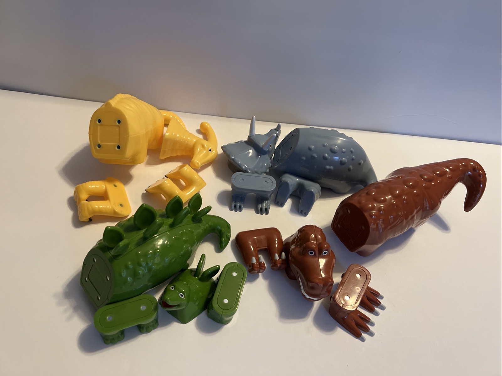Popular Playthings Magnetic Mix or Match Dinosaurs Lot Of 4 All Here.