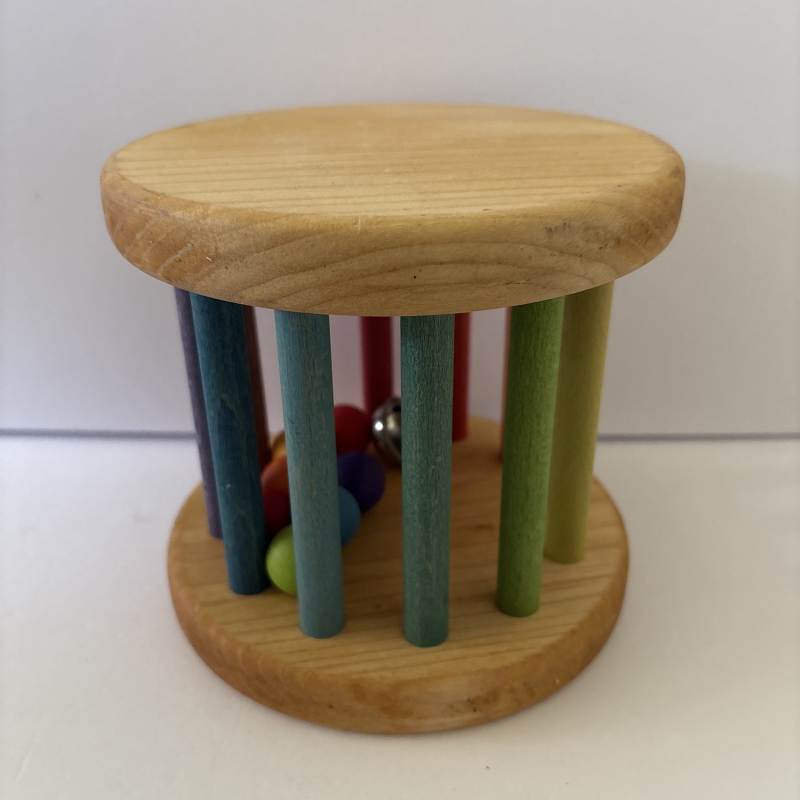 Grimm’s Spiel & Holz Wooden Rainbow Rolling Wheel Toy