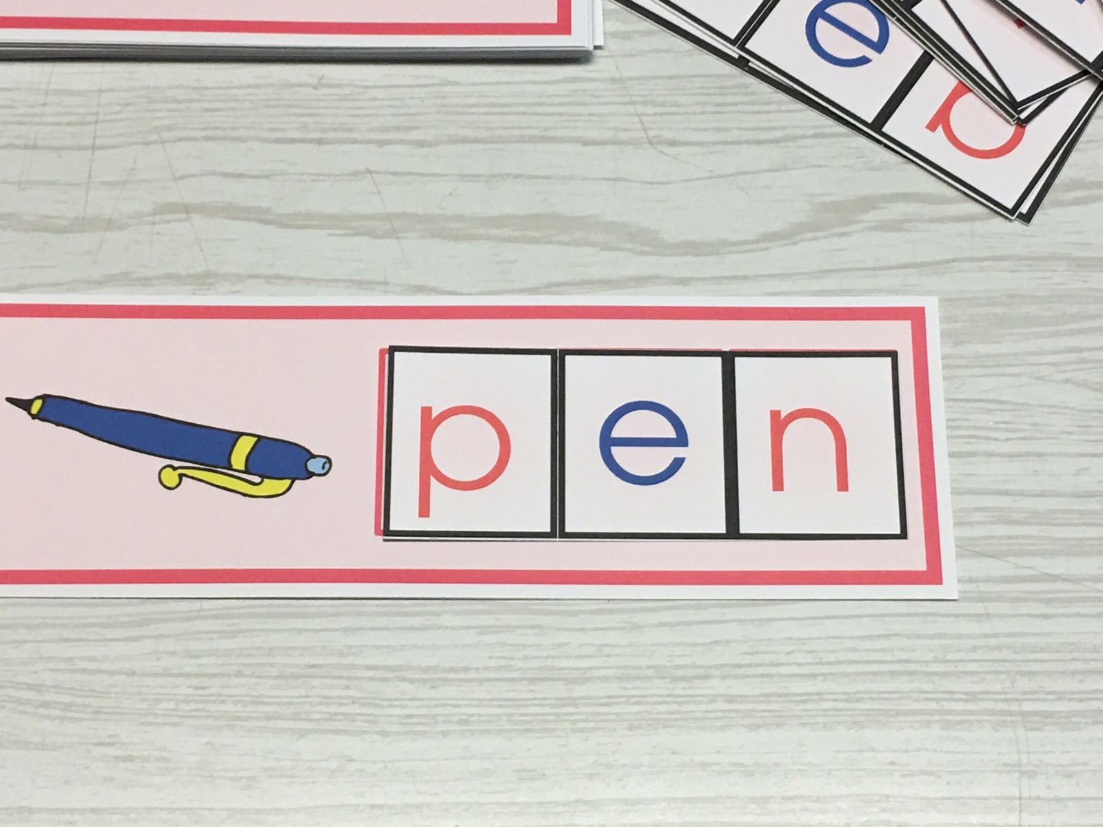 The Pink Series – Picture Strips with Movable Letters Montessori
