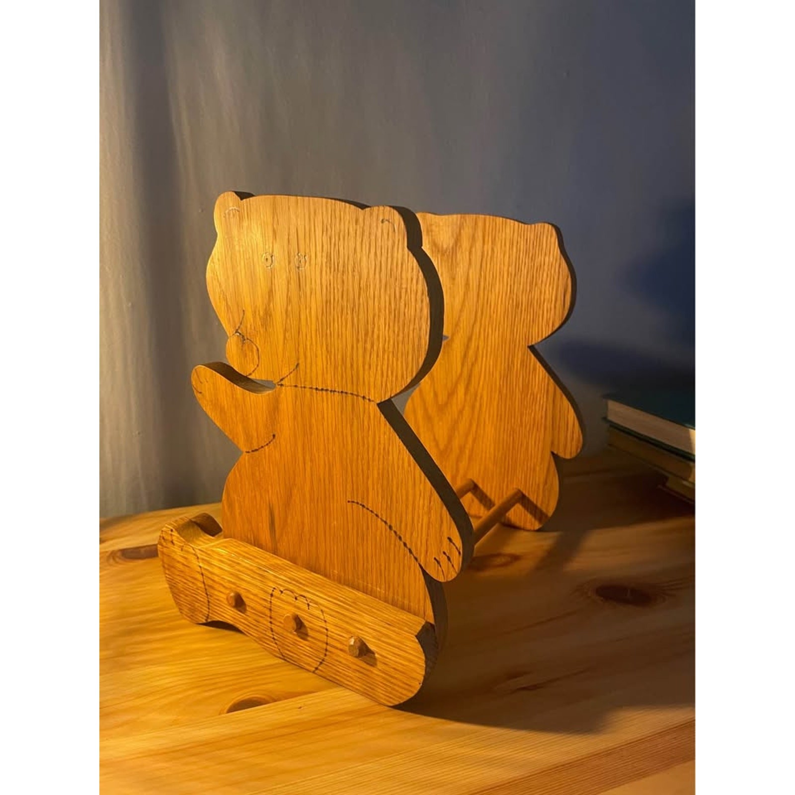 Vintage wooden bear book holder