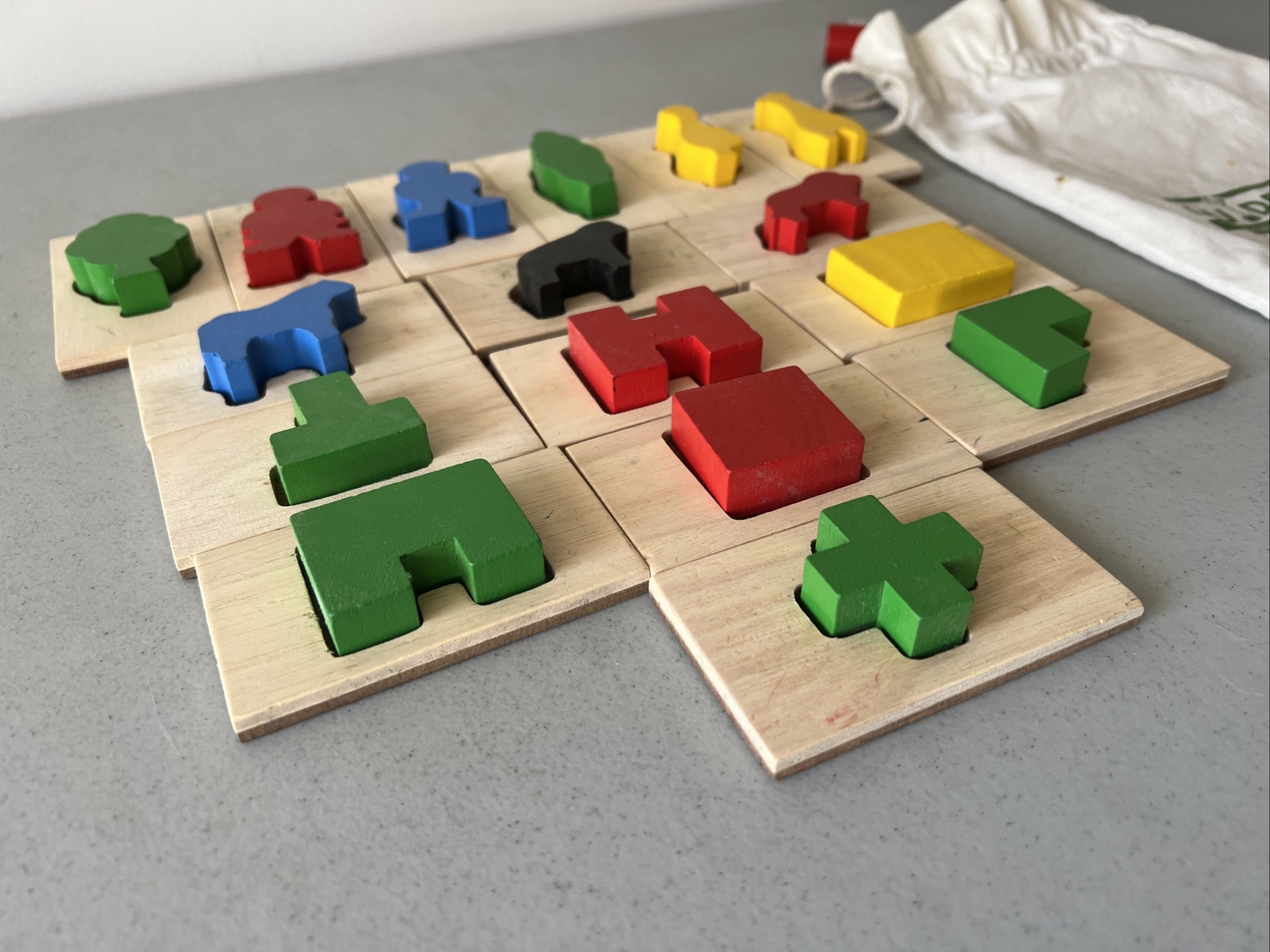 Guidecraft 3D Feel and Find Kids Game Wooden Matching Shapes w/ Bag Wood Animals