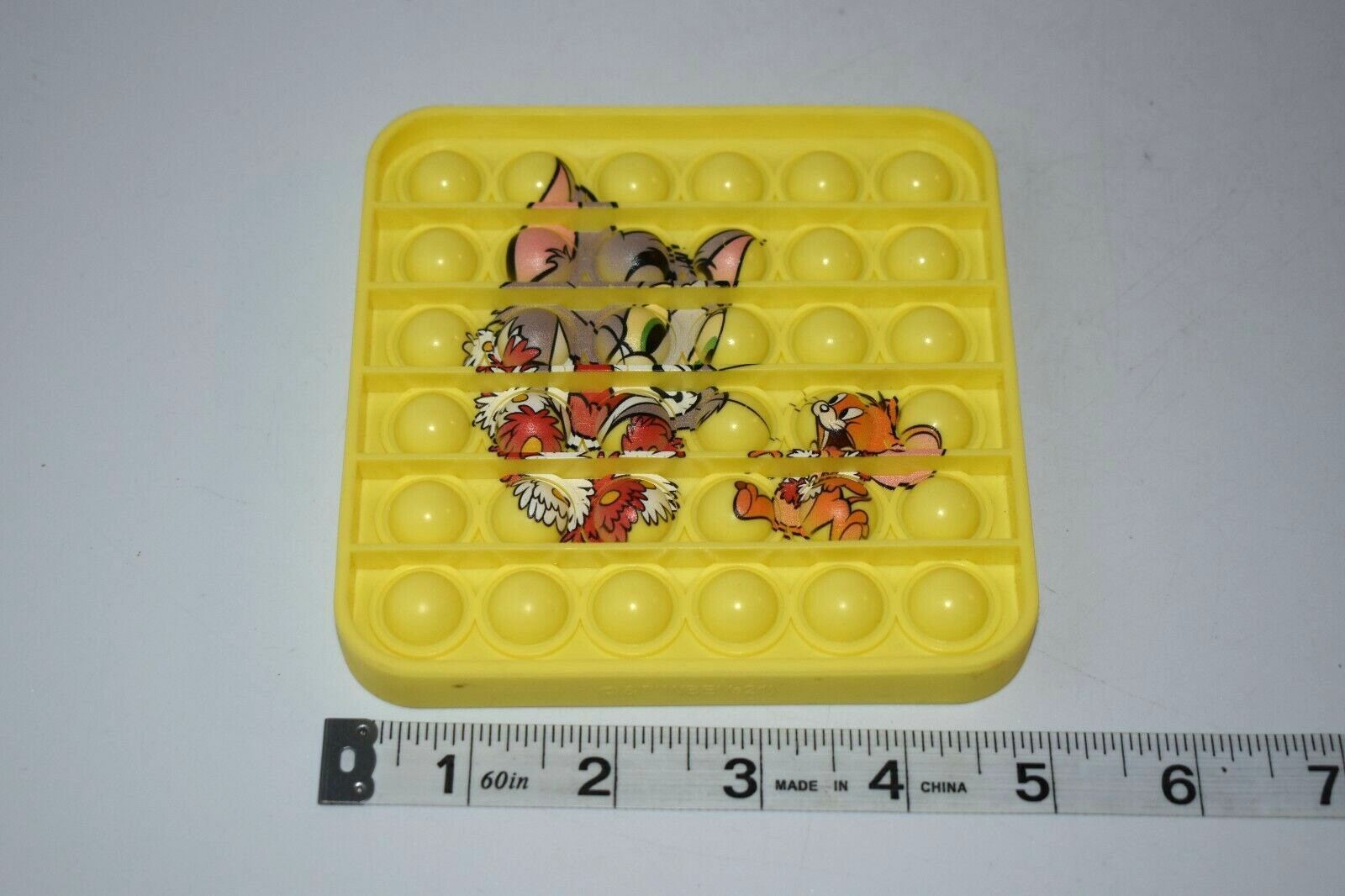 Tom & Jerry Yellow Square Cat Mouse Push Pop Squisher
