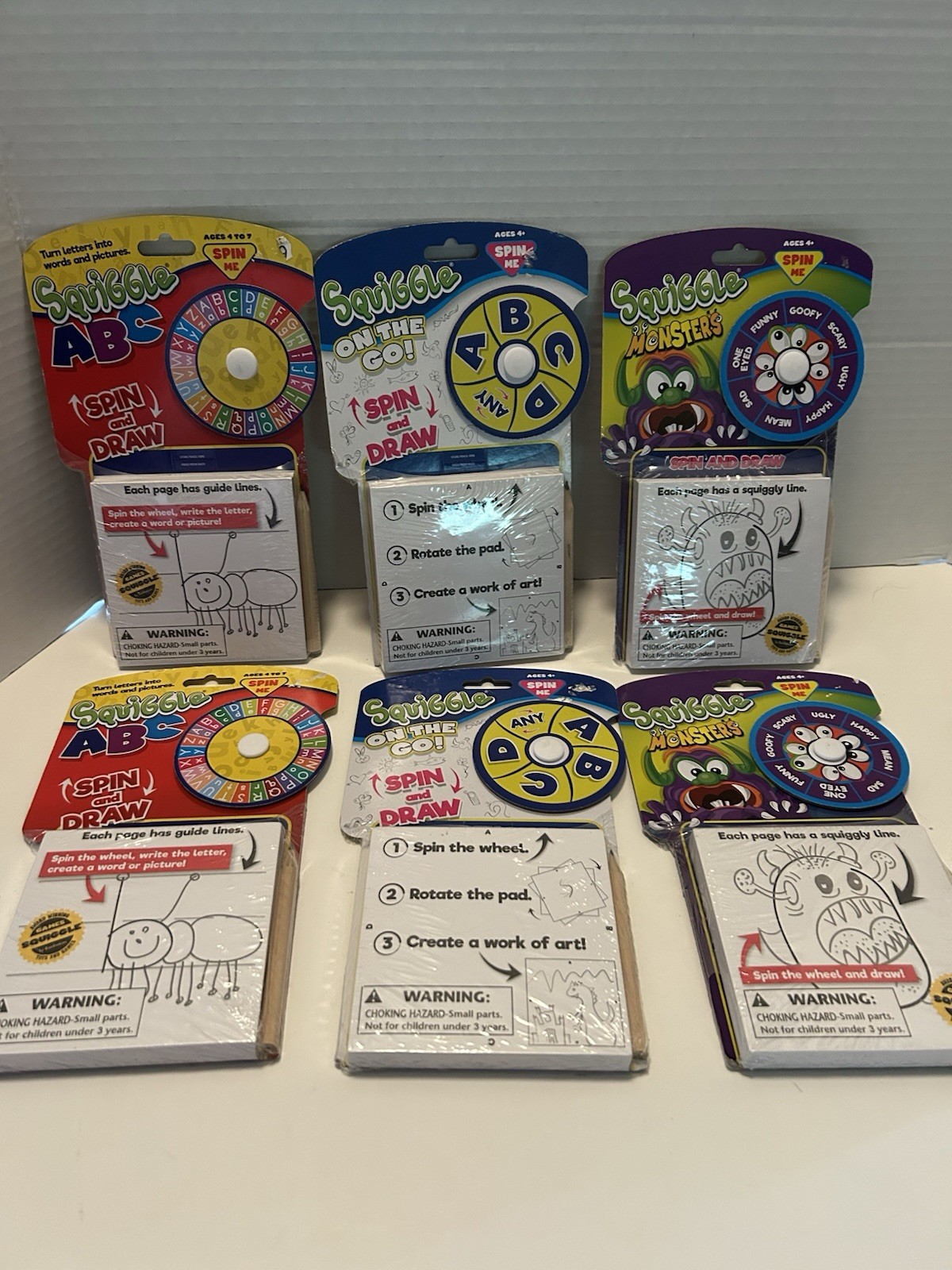 SQUIGGLE GAMES . Lot Of 6. Educational Learning Games Three Different- NEW.