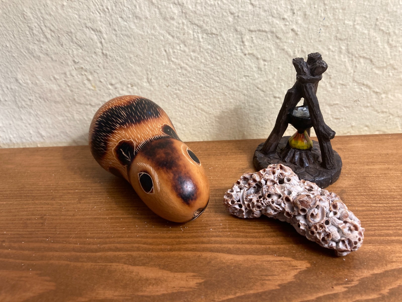 Dozen sand tray figures focus on change, challenges, growth, and stability