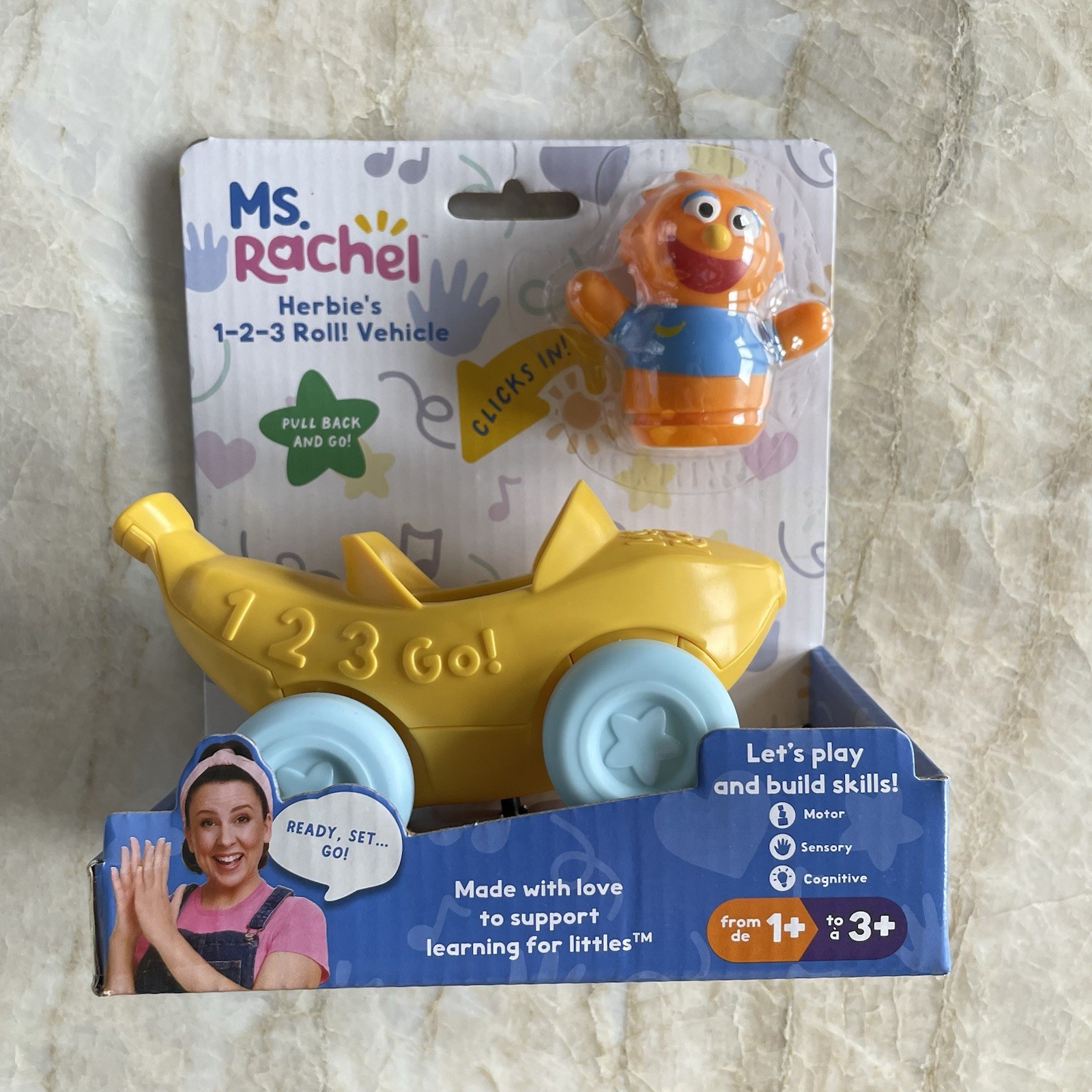 Ms. Rachel, Herbie’s 1-2-3 Roll! Vehicle with Click-in Figure & Pull Back Car