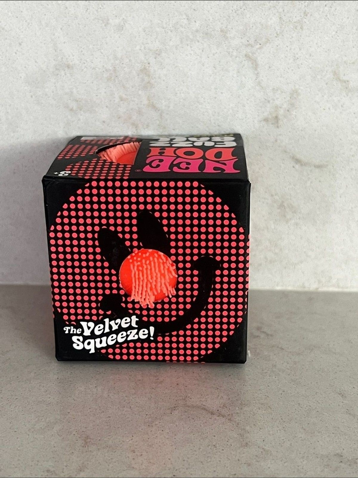 NeeDoh Fuzz Ball Flower Power Orange groovy