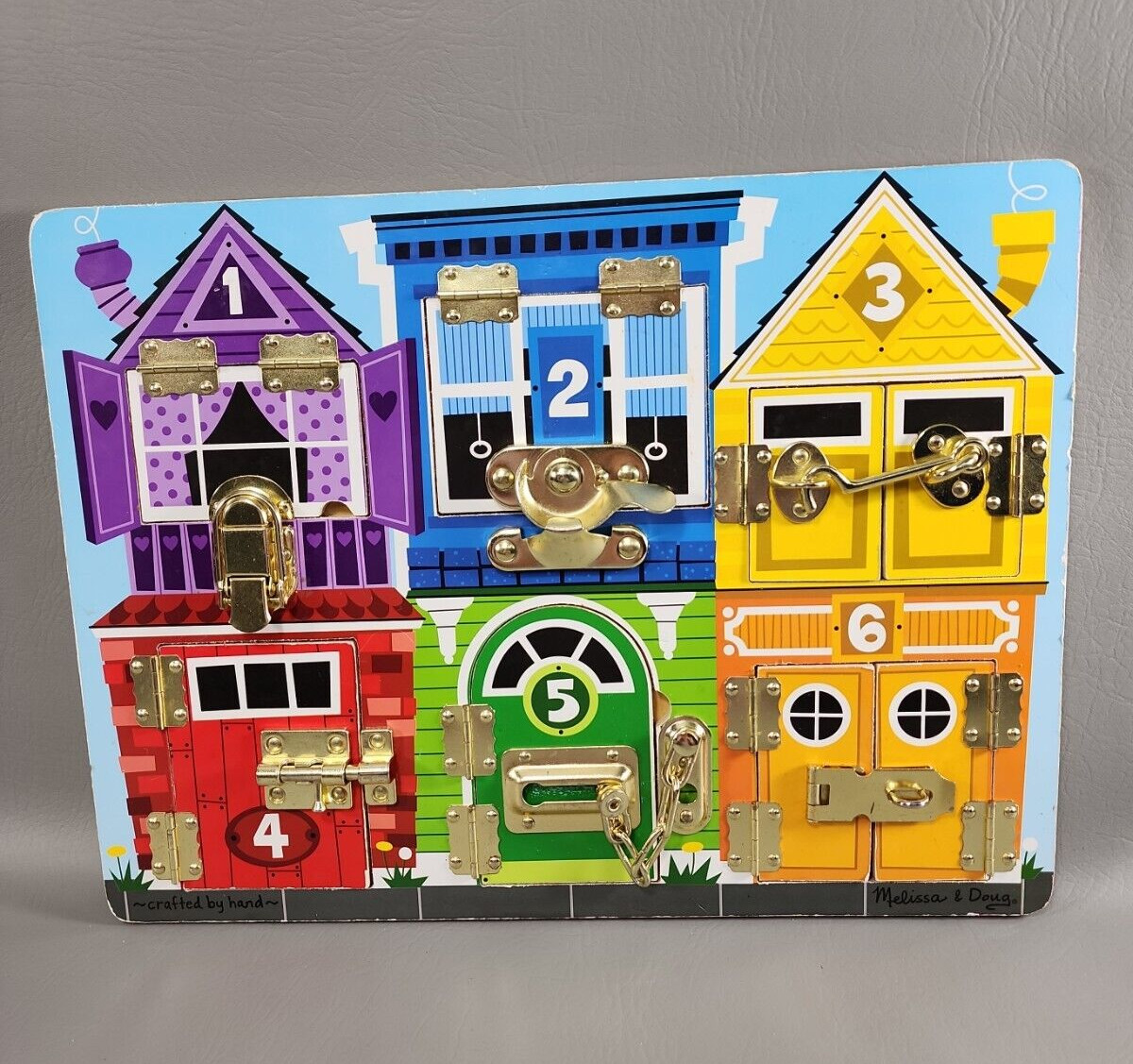 Melissa & Doug Learning -Latches, Buckle, Hook, Numbers, & Colors Activity Board