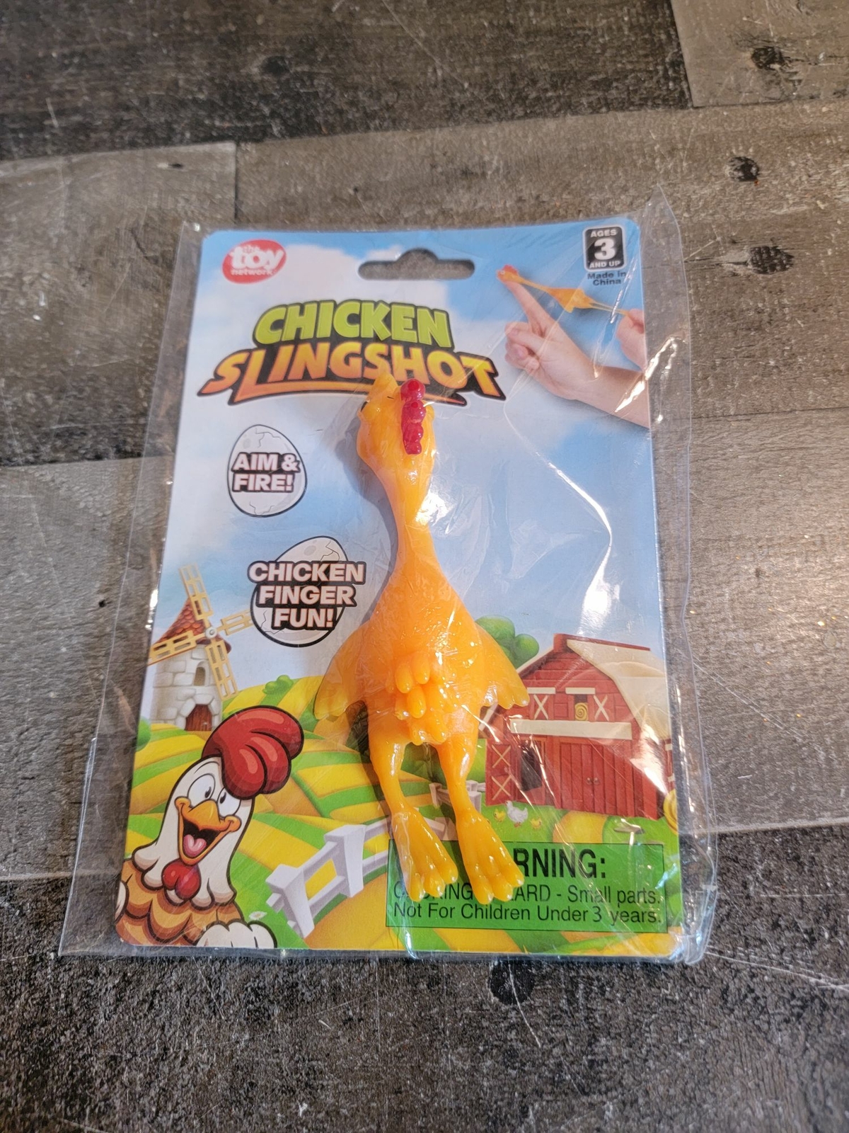 Toy Network chicken finger slingshot figure