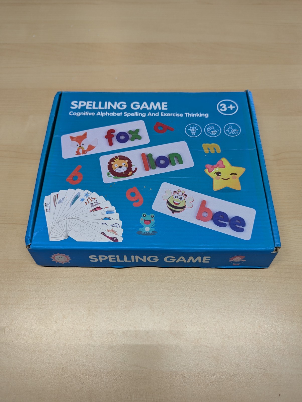 Spelling Game With Wooden Letters And Cards With Pictures