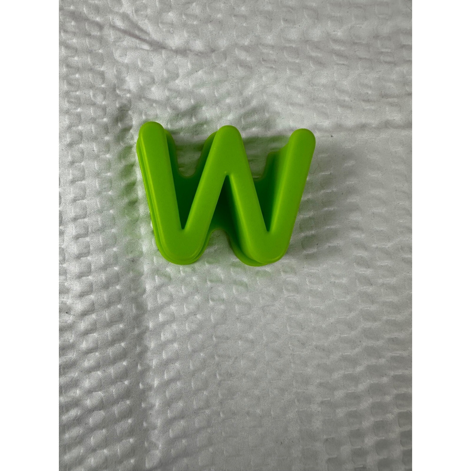 Letter “W” for Elmo On The Go learning game.