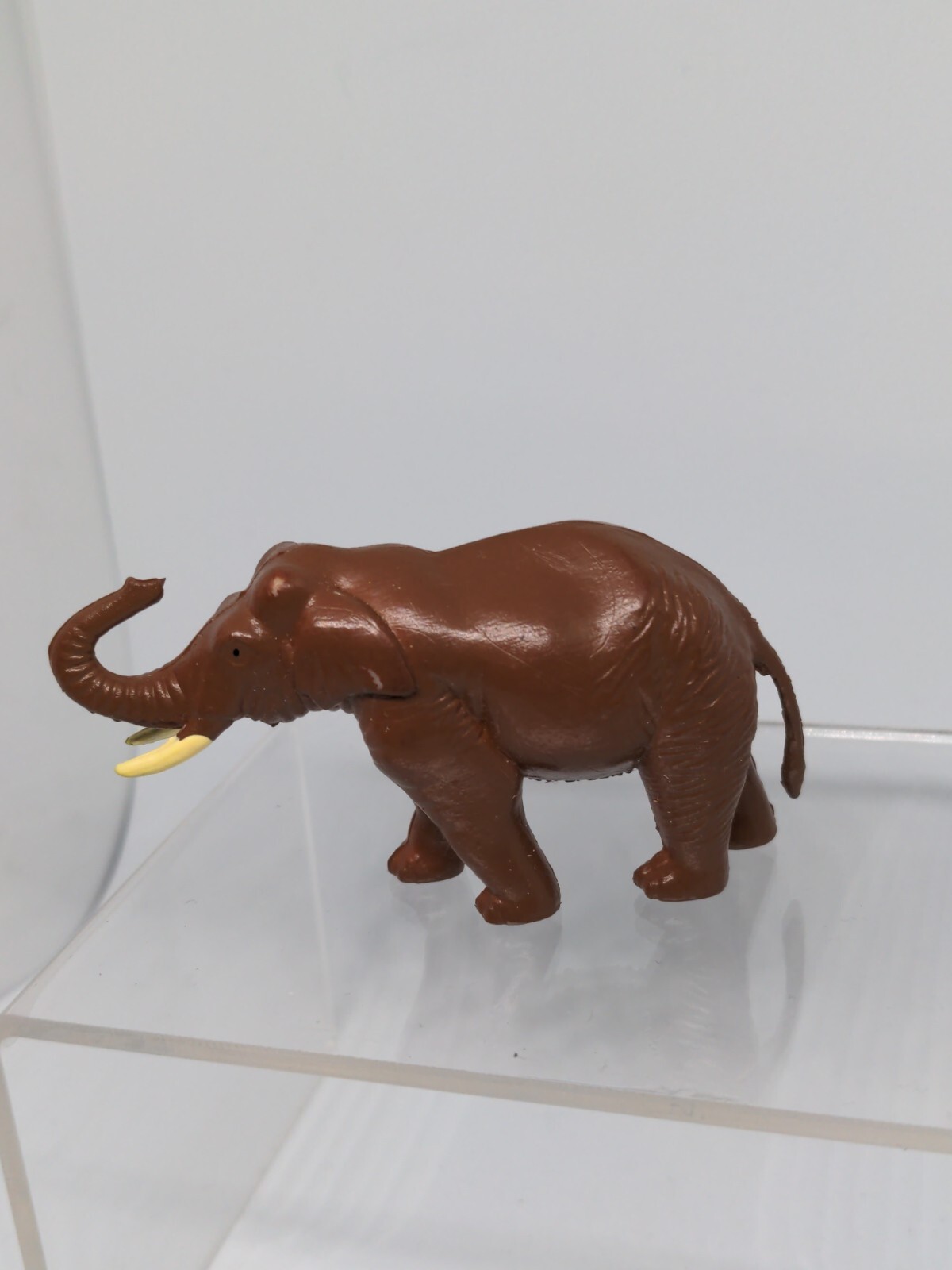 Elephant Asian Replica plastic 3 inches long Dark Brown Tusk