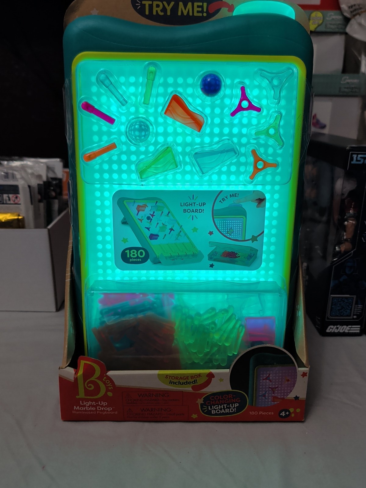 B. Toys 180-Piece Color-Changing Light-Up Board With Peg & Marble Run Set