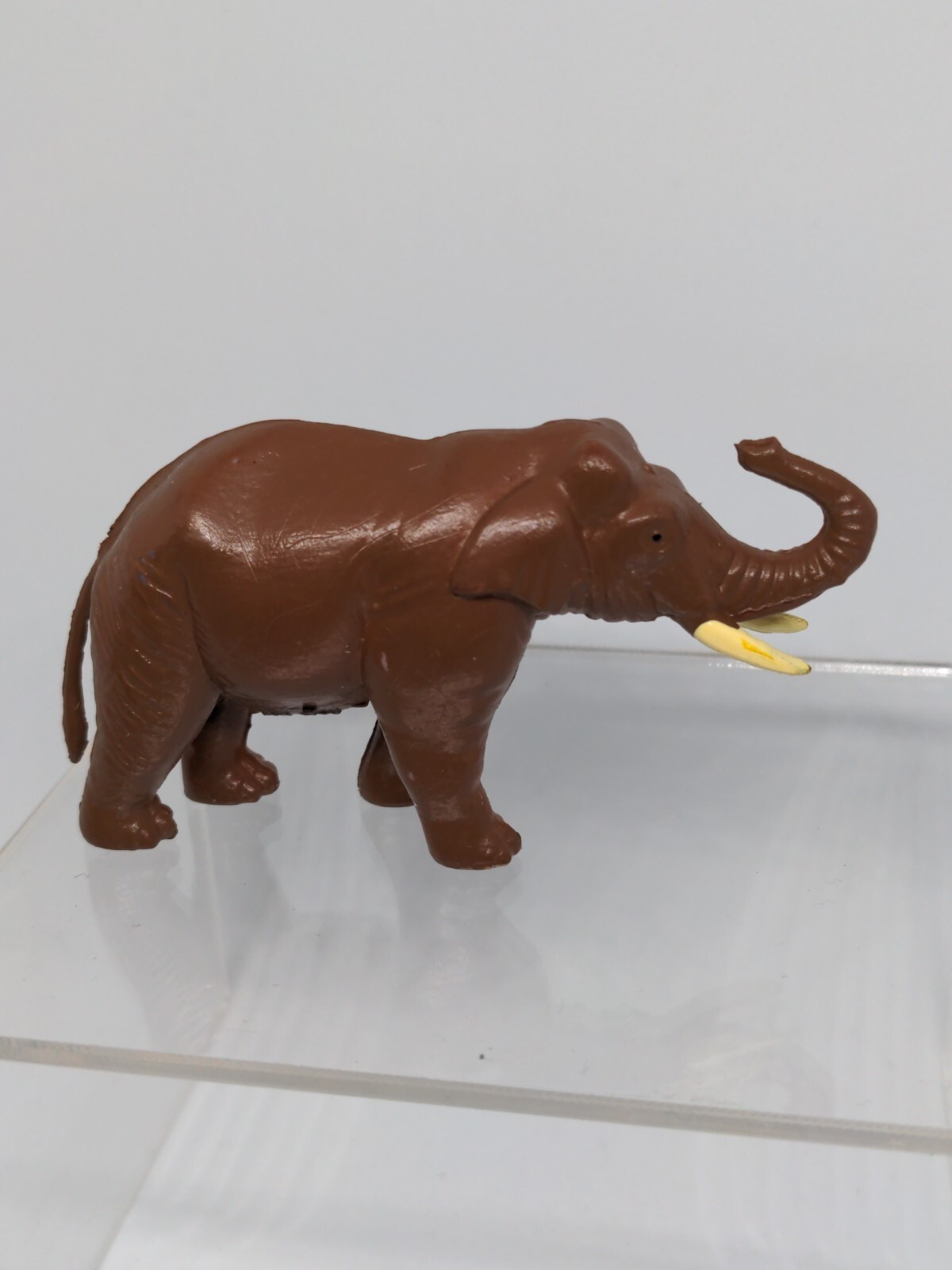 Elephant Asian Replica plastic 3 inches long Dark Brown Tusk