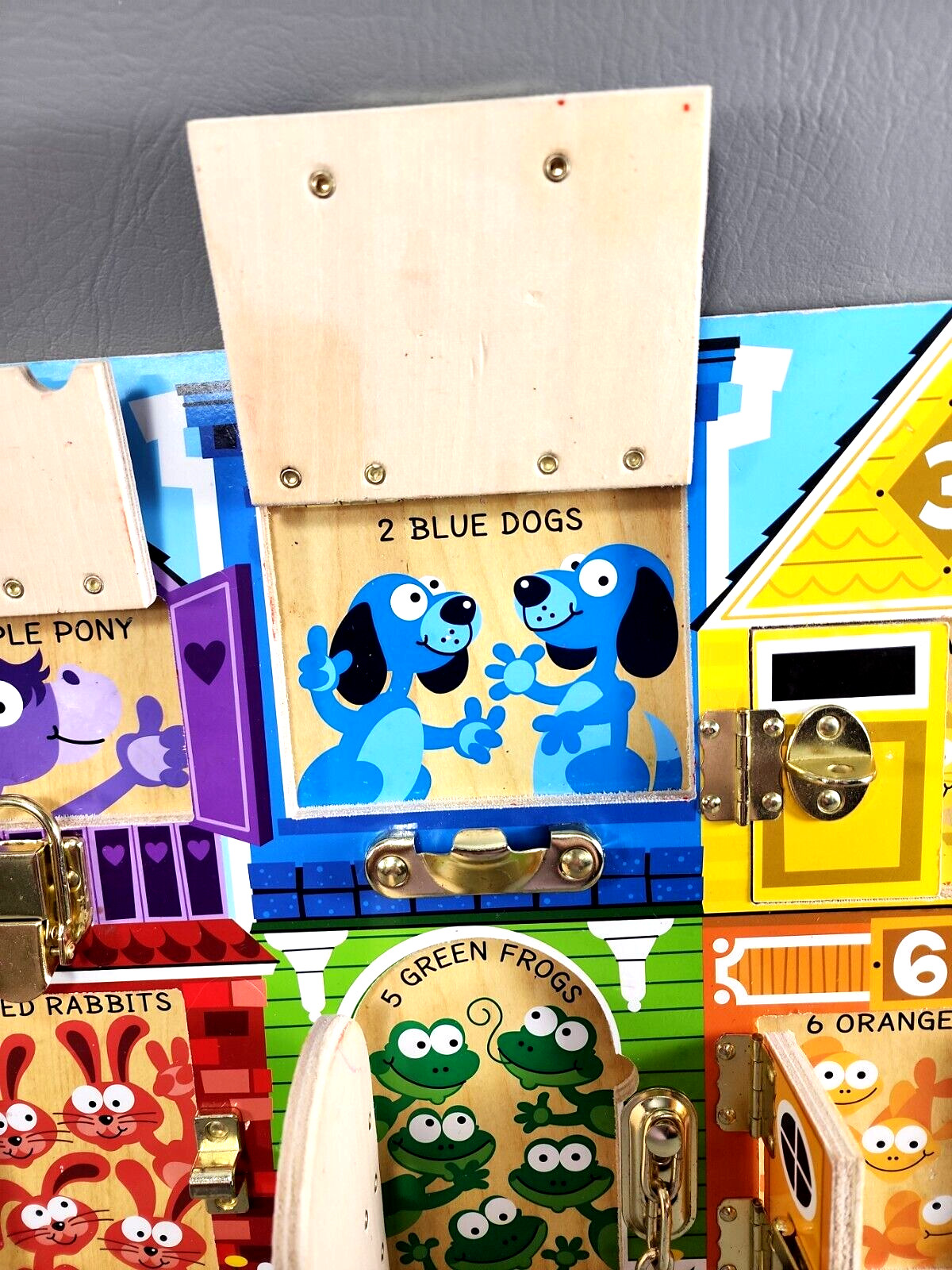 Melissa & Doug Learning -Latches, Buckle, Hook, Numbers, & Colors Activity Board