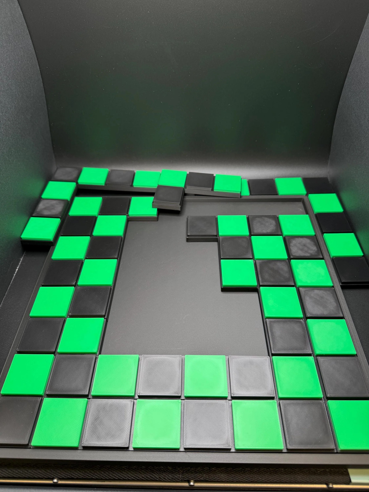 Checkerboard Dissection Puzzle by Sam Loyd
