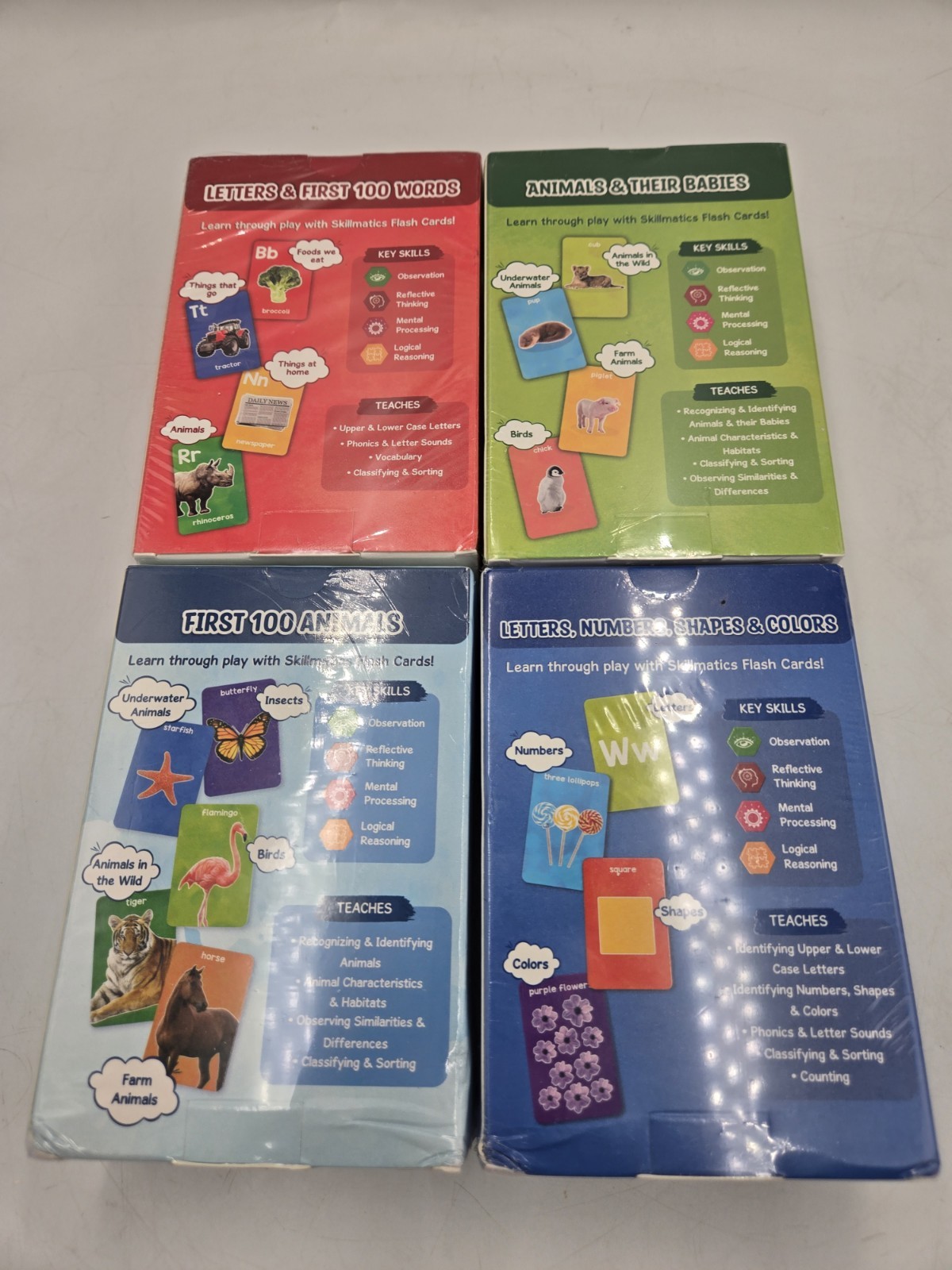 Skillmatics Flash Cards Lot Of 4. Letters Numbers Shapes & Colors, 100 Animals
