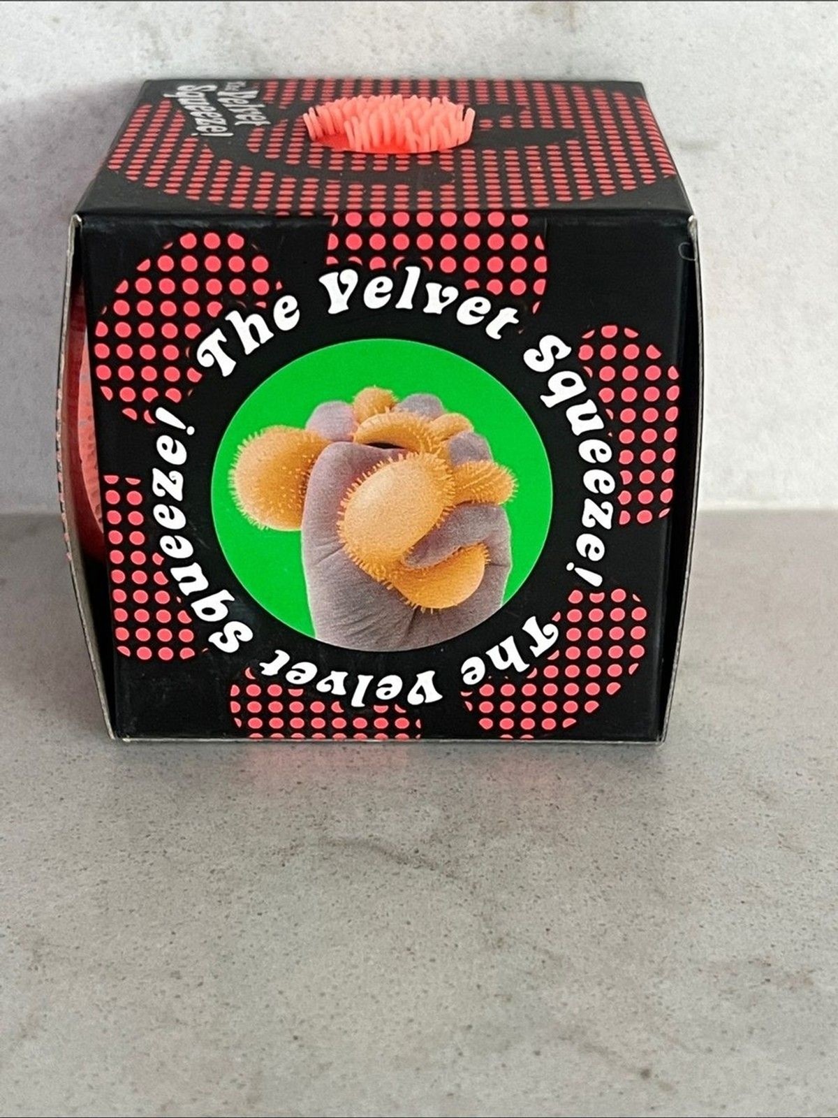 NeeDoh Fuzz Ball Flower Power Orange groovy