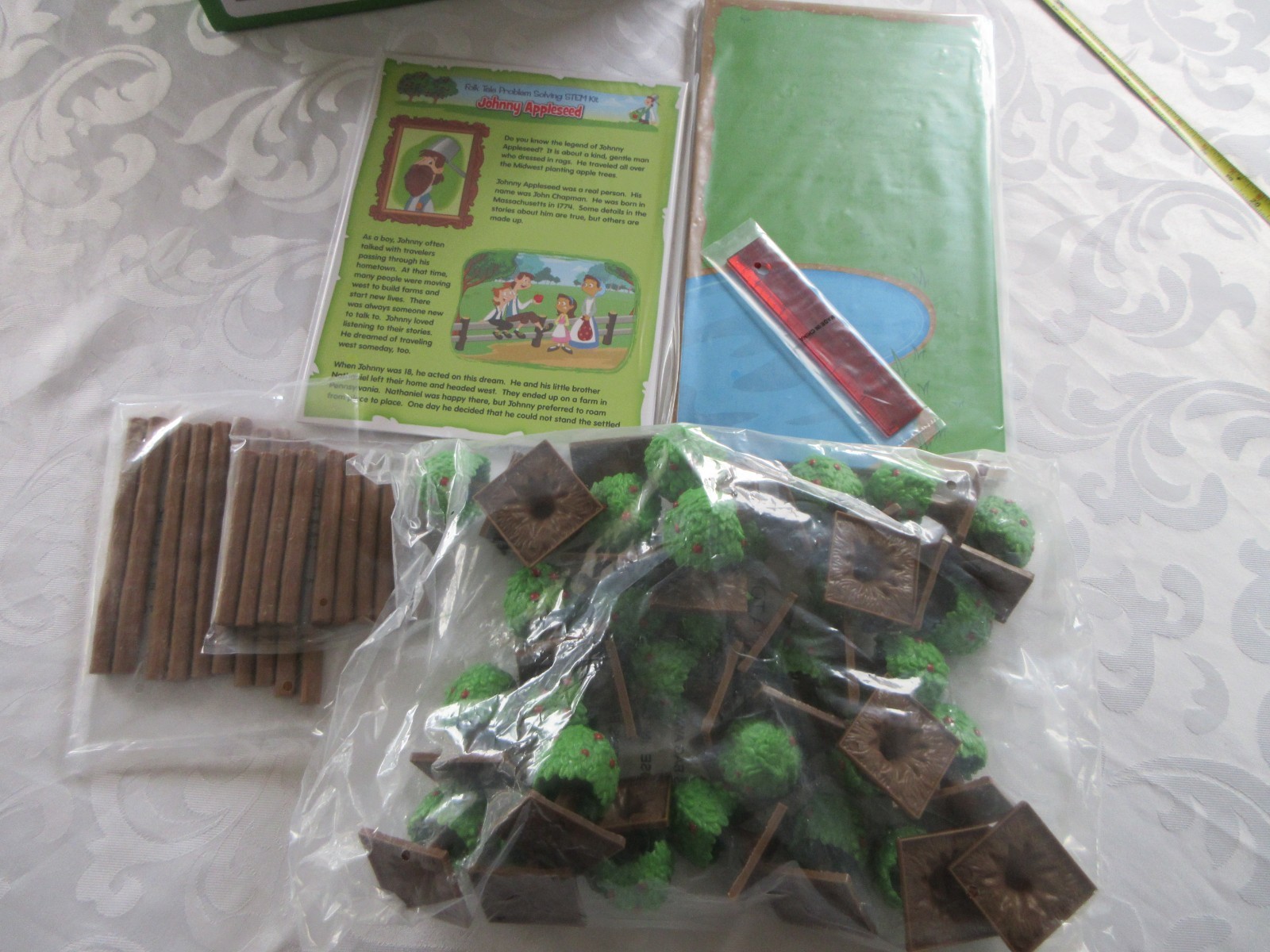 Lakeshore Stem Folk Tales Problem Solving Kit Johnny Appleseed, OPEN BOX NEW