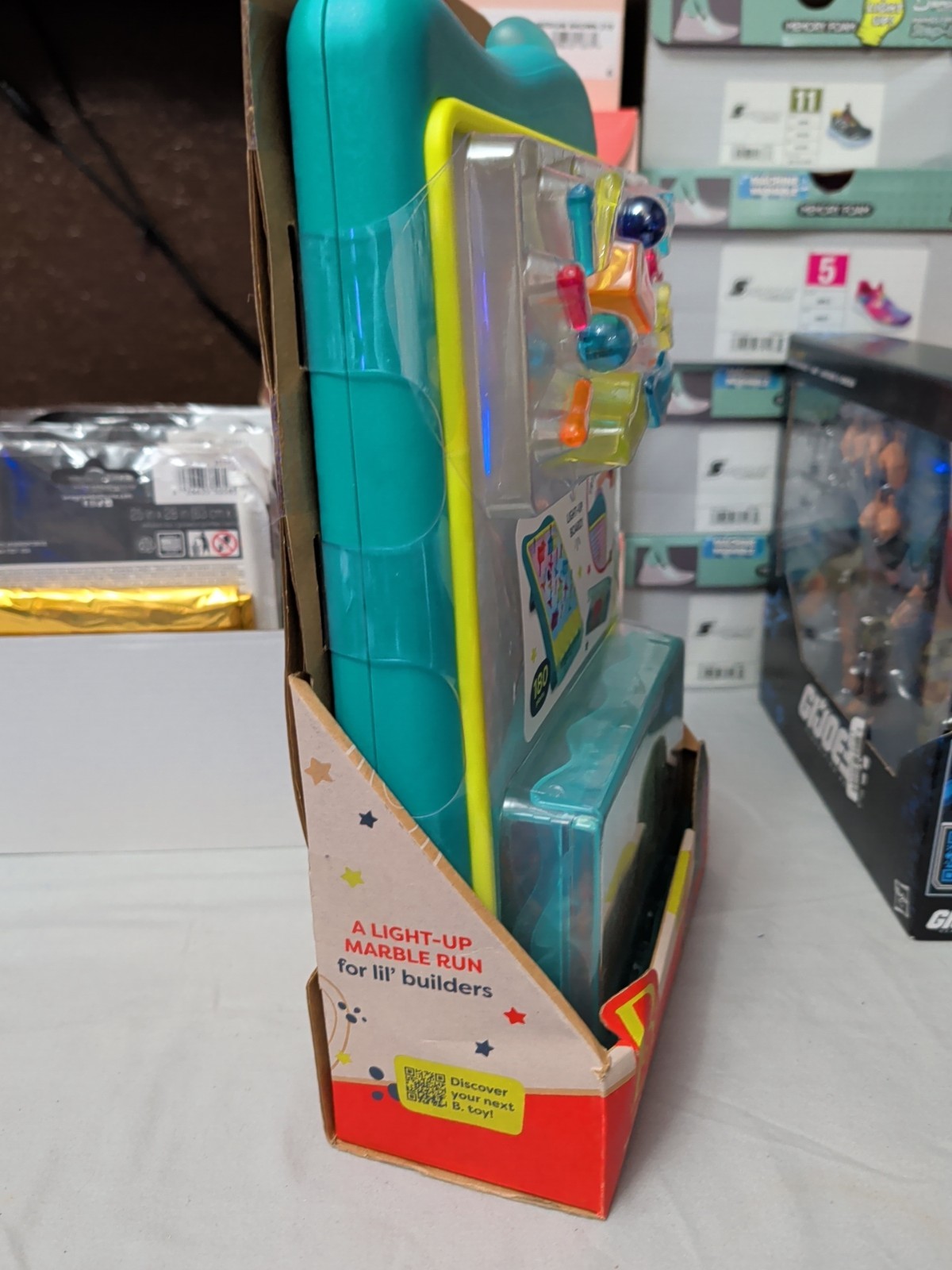 B. Toys 180-Piece Color-Changing Light-Up Board With Peg & Marble Run Set