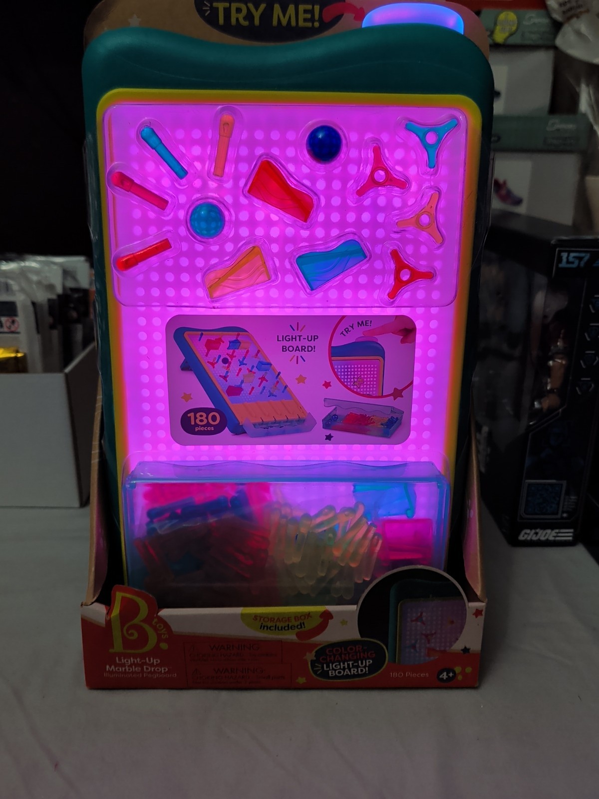 B. Toys 180-Piece Color-Changing Light-Up Board With Peg & Marble Run Set