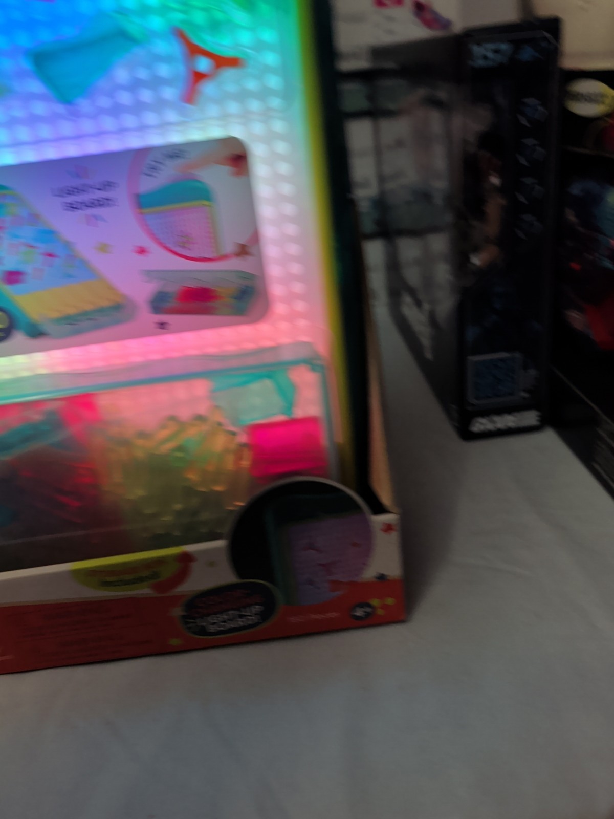 B. Toys 180-Piece Color-Changing Light-Up Board With Peg & Marble Run Set