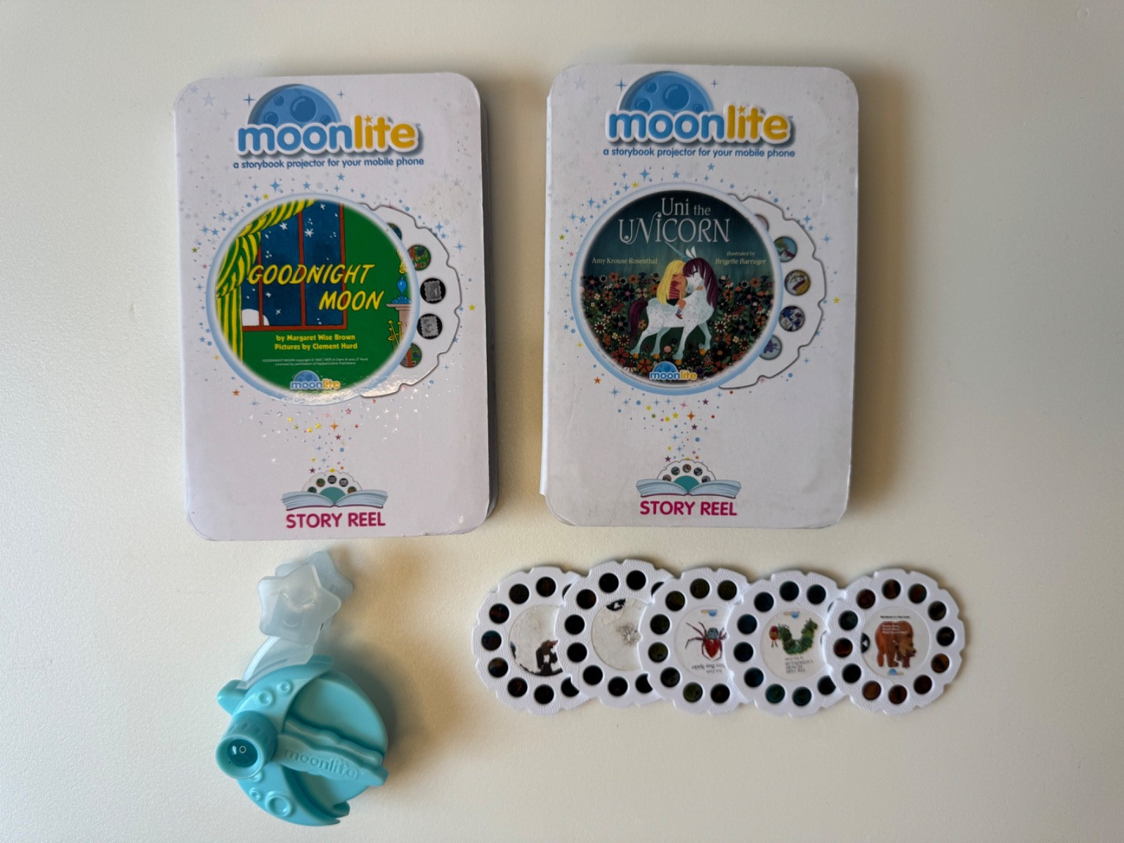 Moonlite Projector &Story Reels Lot Of 7 No Codes Uni Unicorn Goodnight Moon Etc