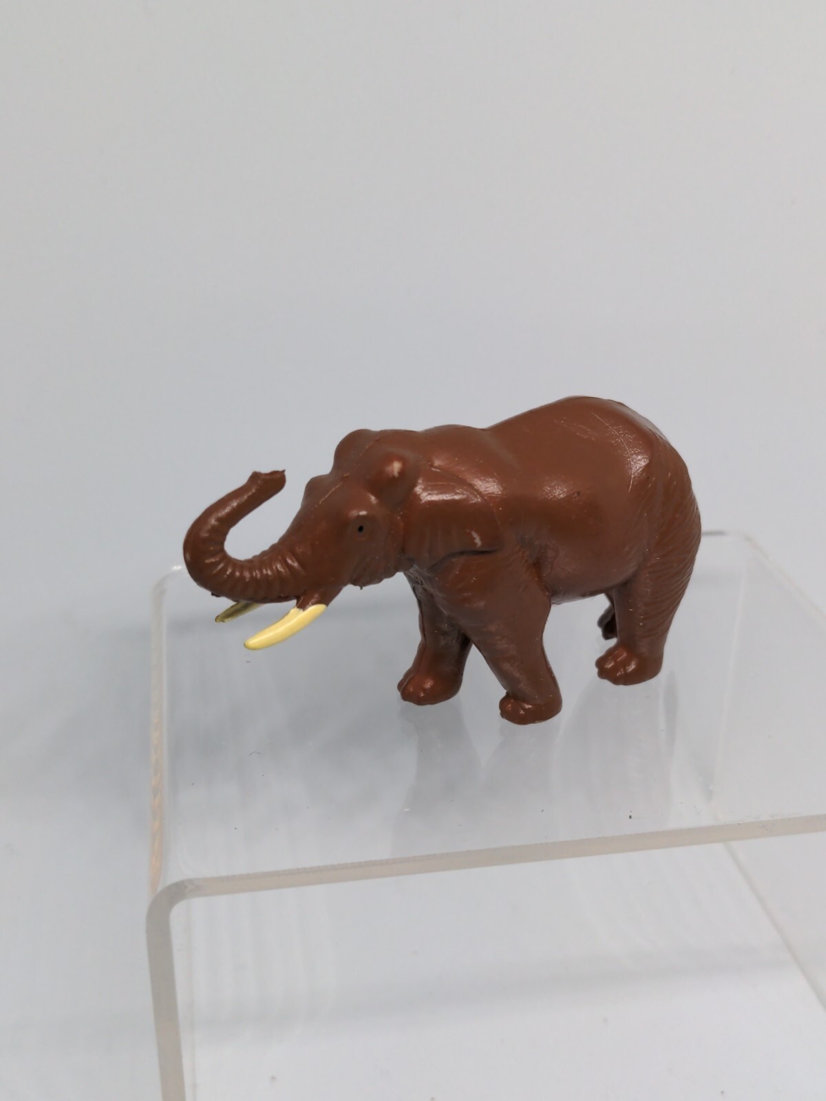 Elephant Asian Replica plastic 3 inches long Dark Brown Tusk
