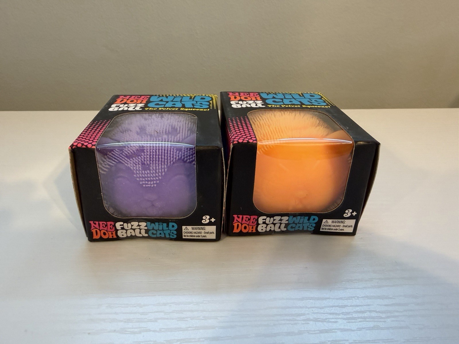 NeeDoh Fuzz Ball Wild Cats- Set of 2 colors. Purple & Orange – RARE