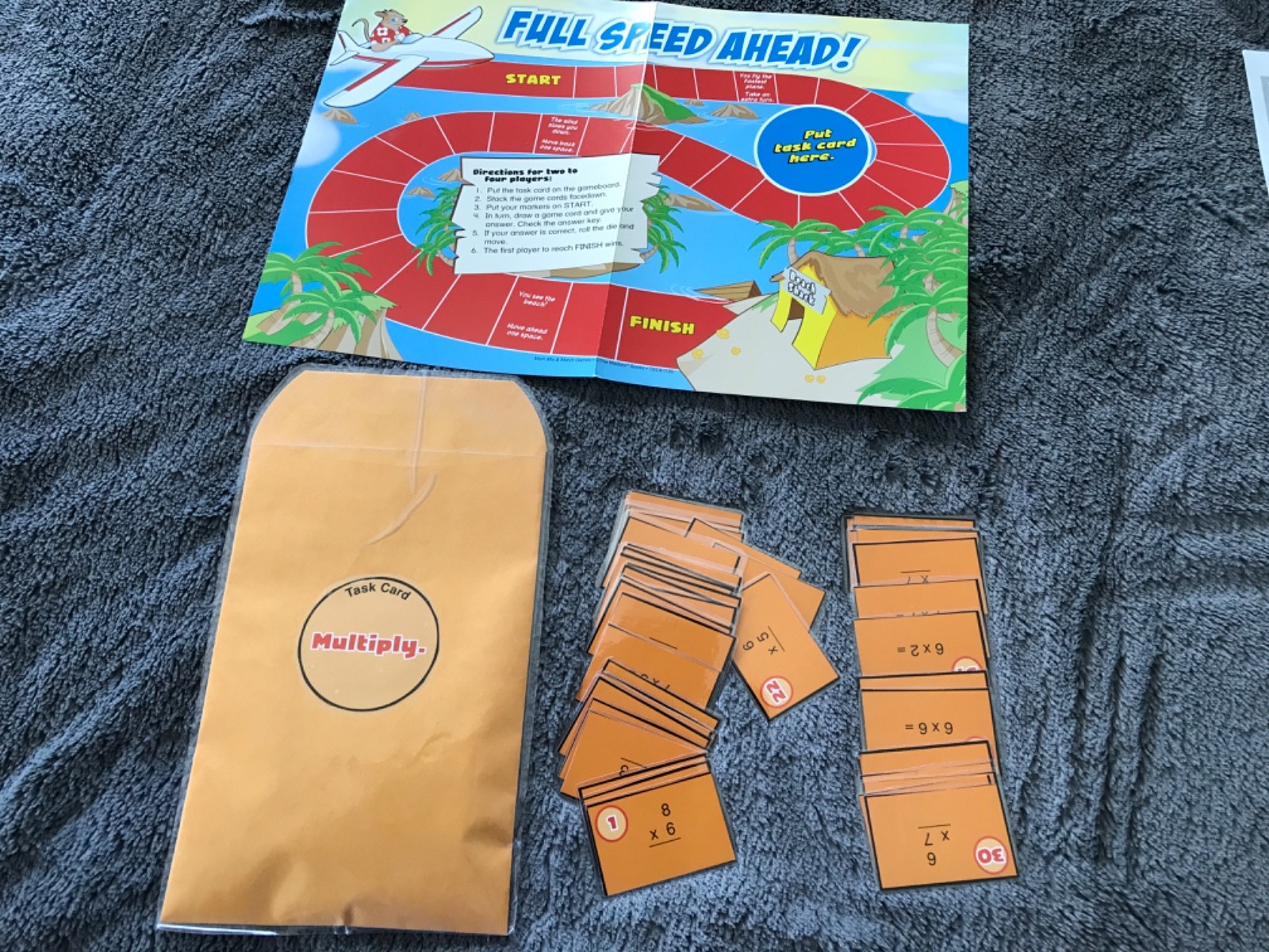 Full speed ahead! Multiply by 6, 7, 8, 9 math file folder game grade 4