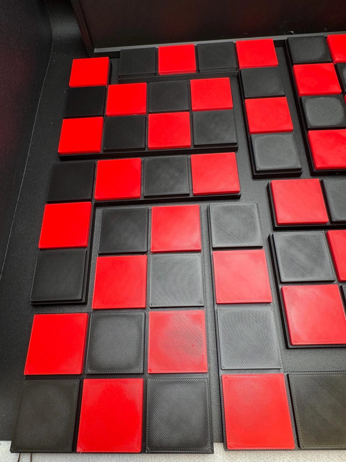 Checkerboard Dissection Puzzle – Battle Royale by Sam Loyd