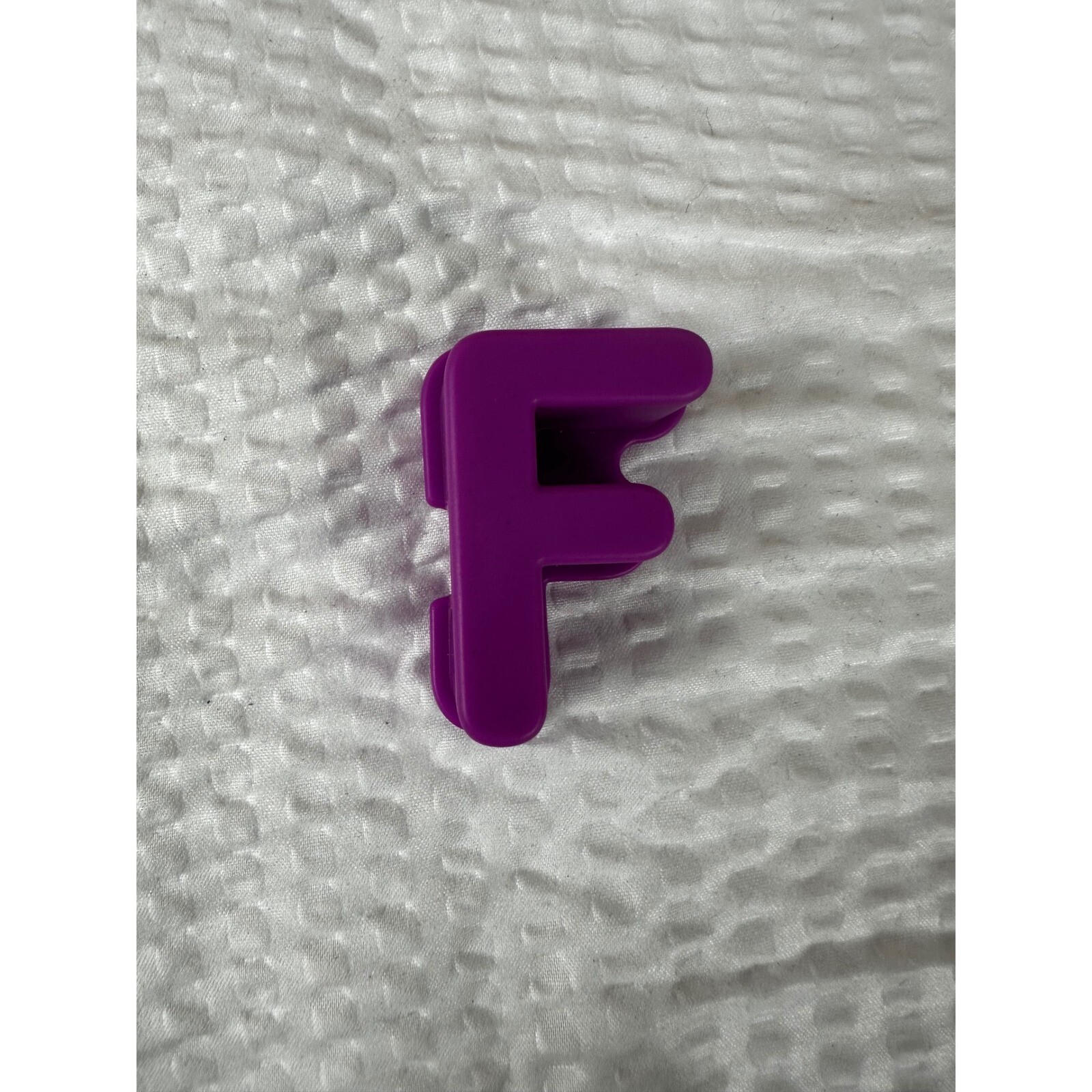 Letter “F” for Elmo On The Go learning game.