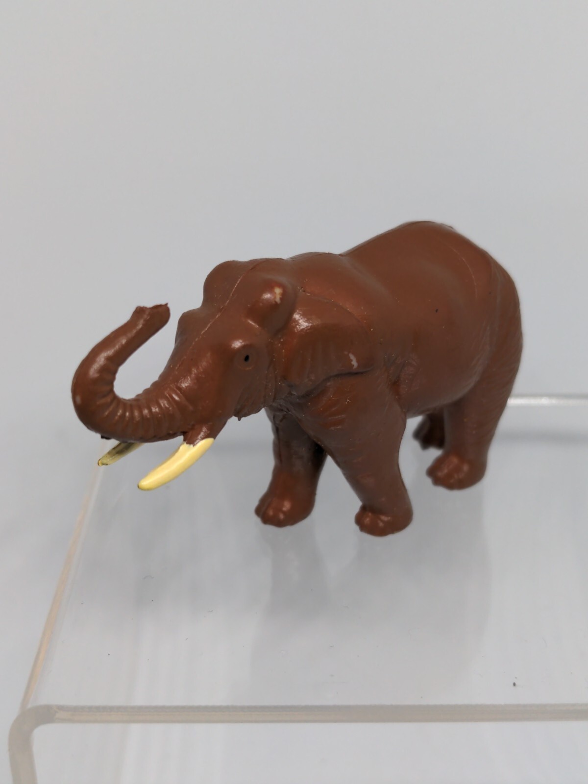 Elephant Asian Replica plastic 3 inches long Dark Brown Tusk