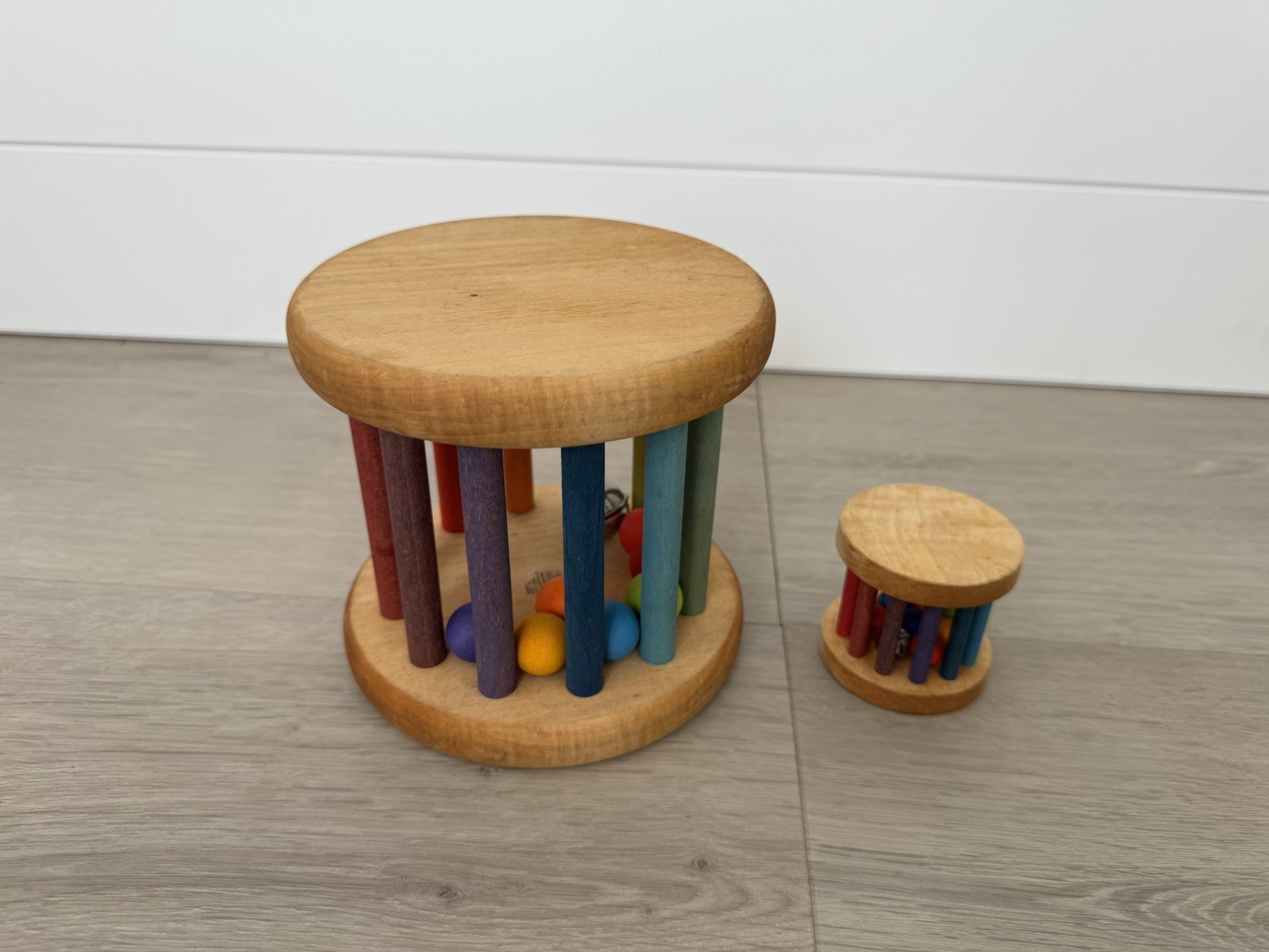 Grimm’s Spiel & Holz Wooden Rainbow Rolling Wheel Toy Large And Small