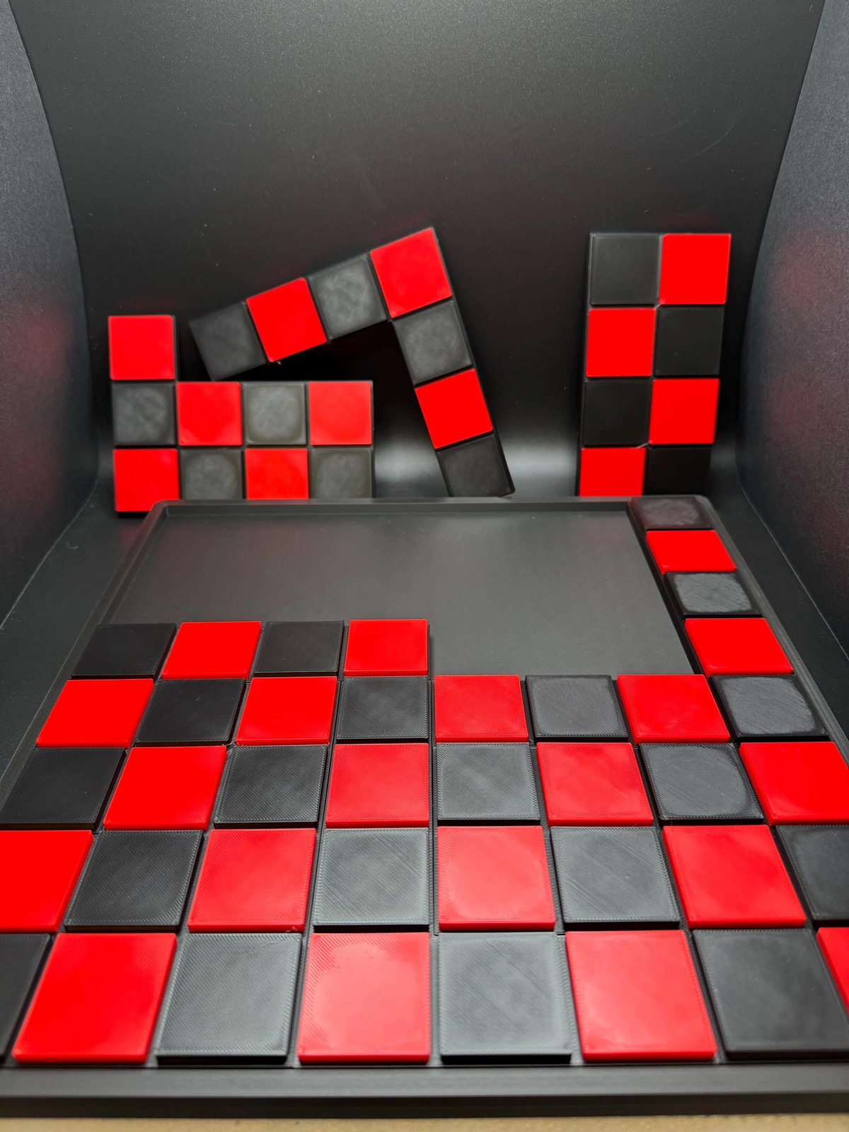Checkerboard Dissection Puzzle – Battle Royale by Sam Loyd