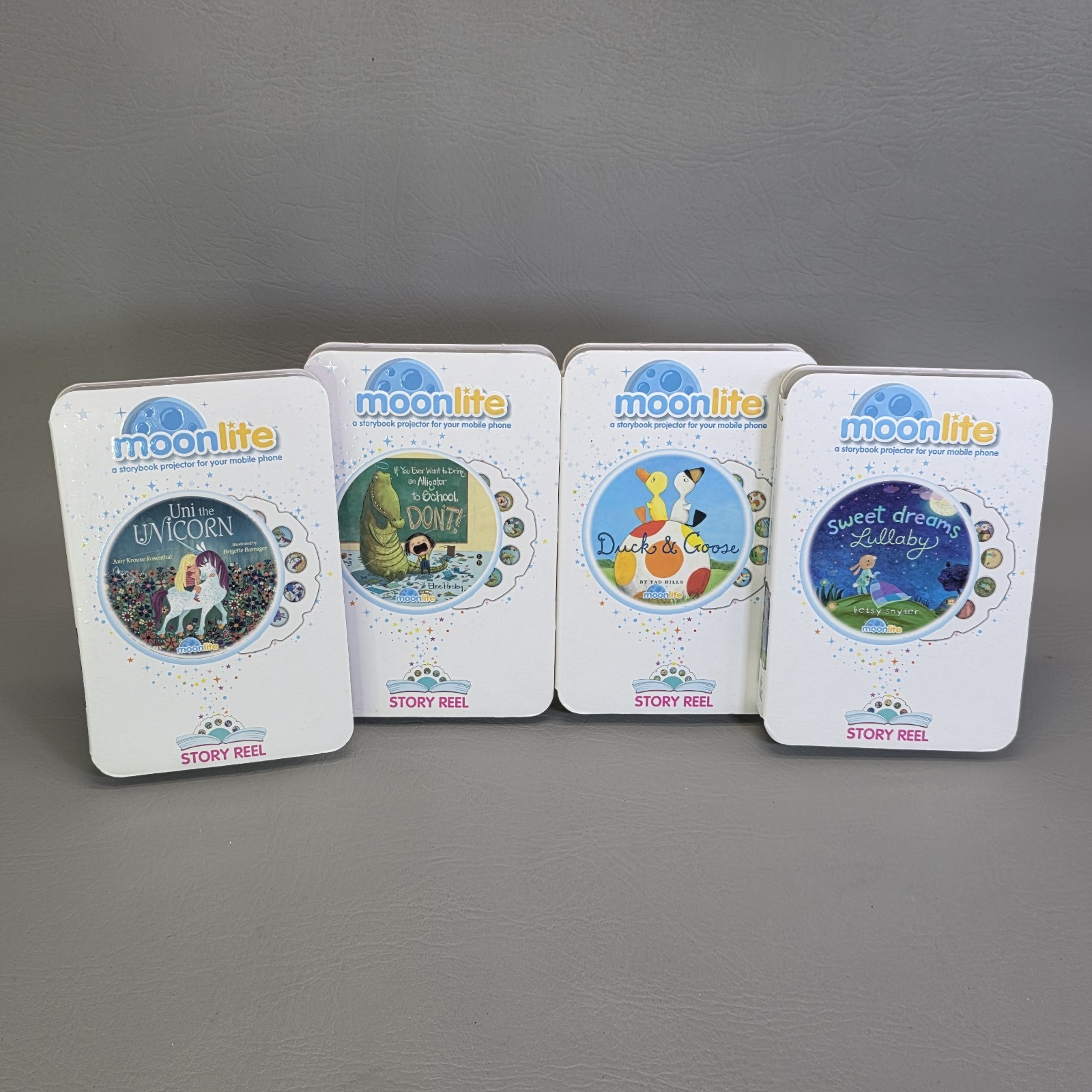 Moonlite Story Reel Lot Of 4 Uni Duck & Goose Lullaby Alligator To School